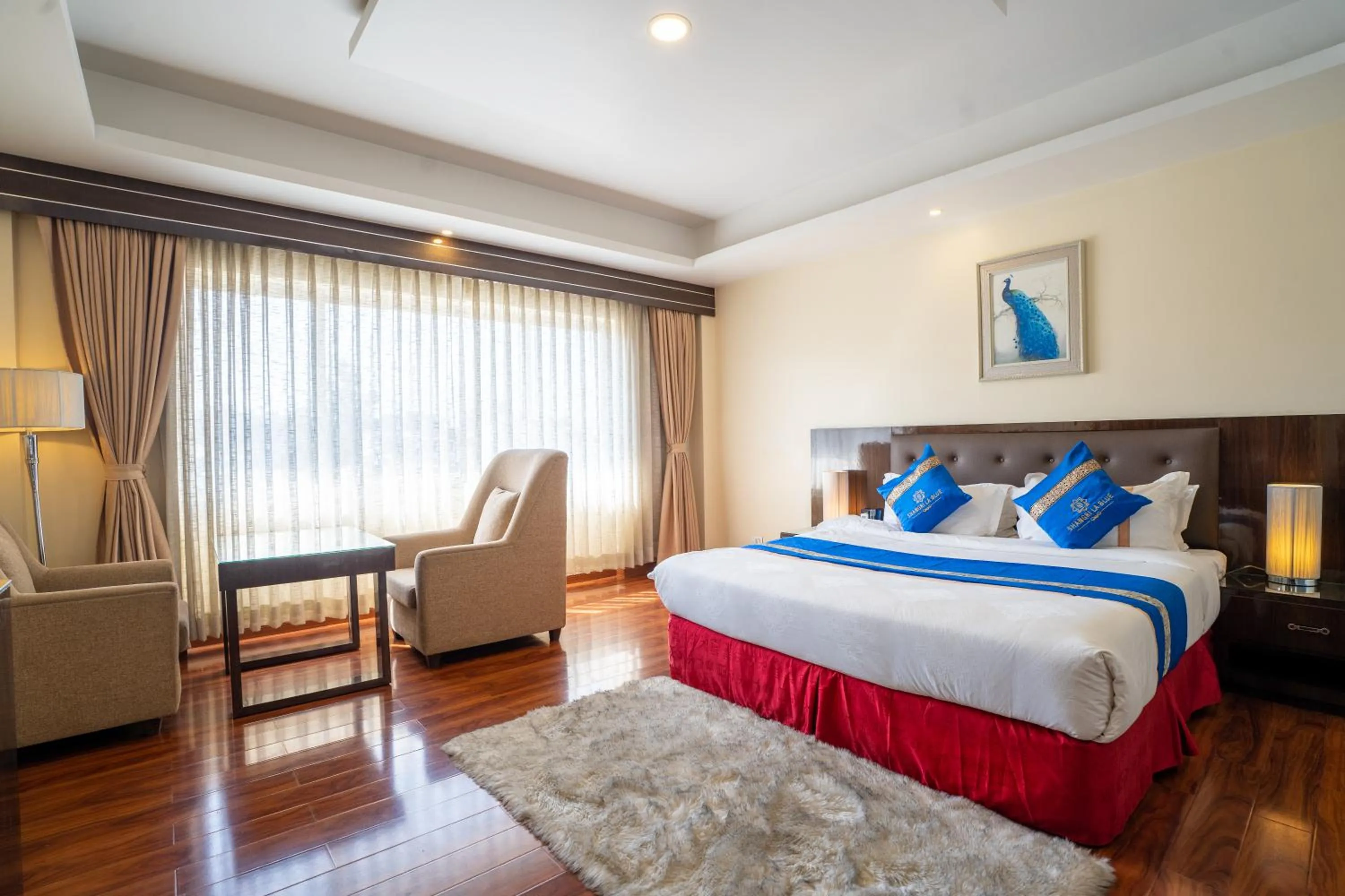 Photo of the whole room, Bed in Shangrila Blu Hotel