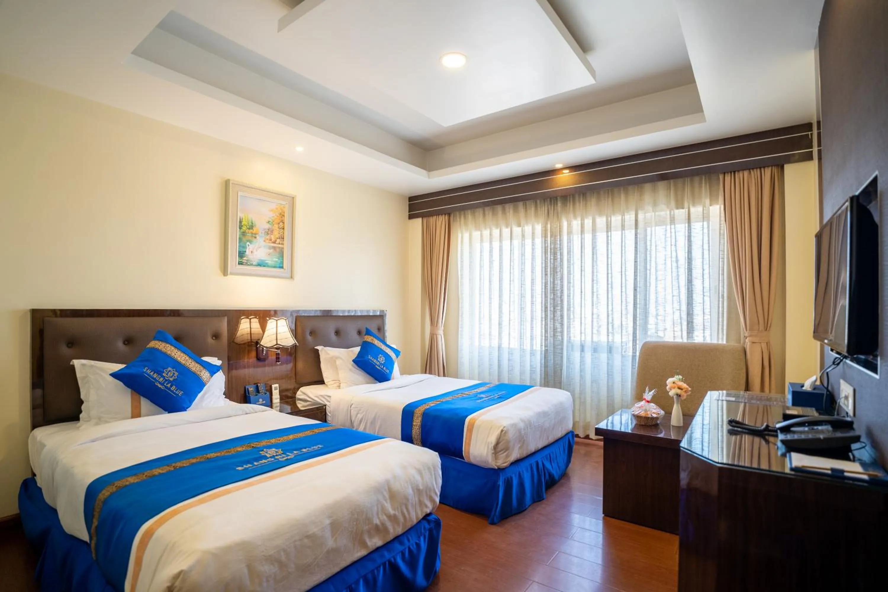 Bed in Shangrila Blu Hotel