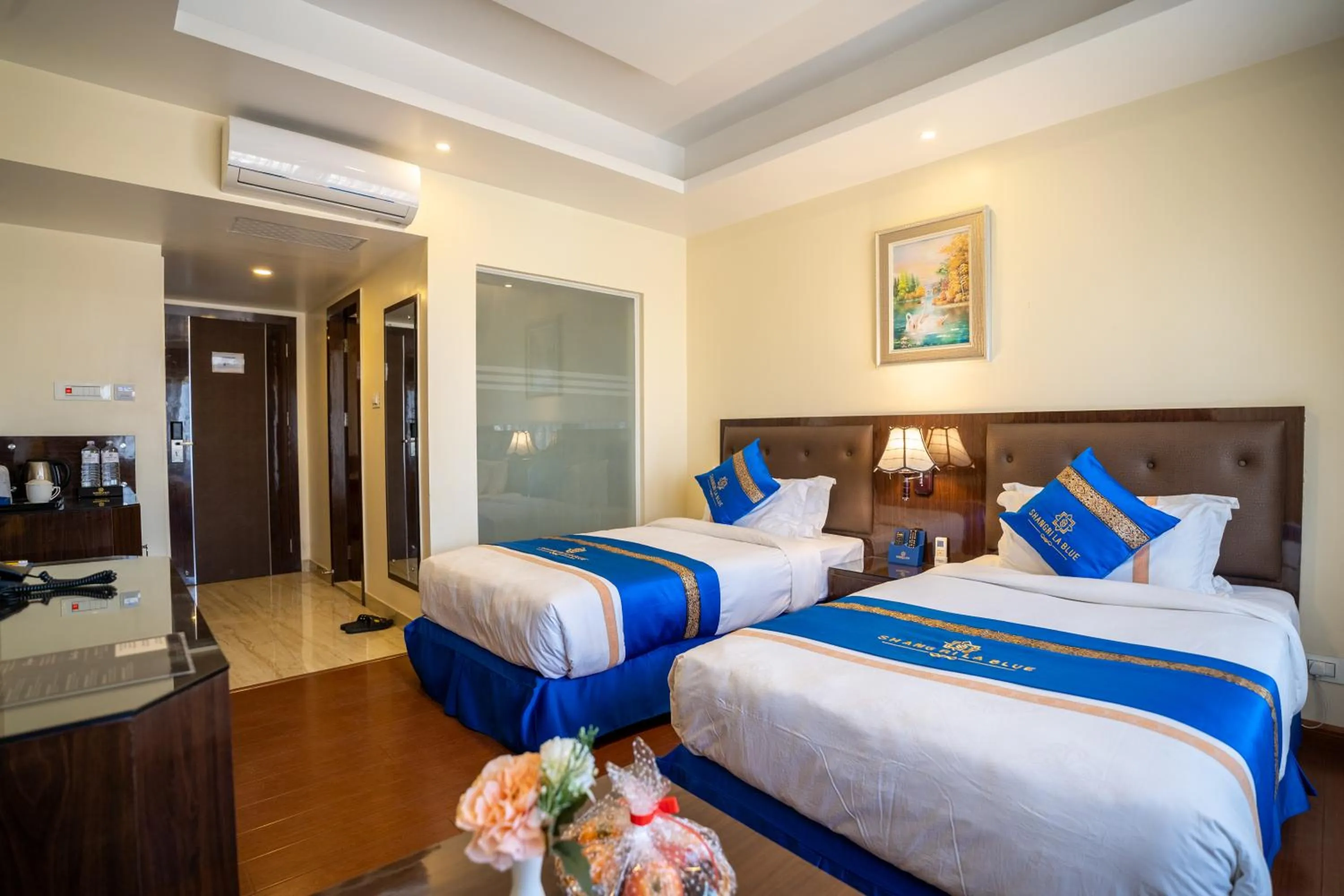 Bed in Shangrila Blu Hotel