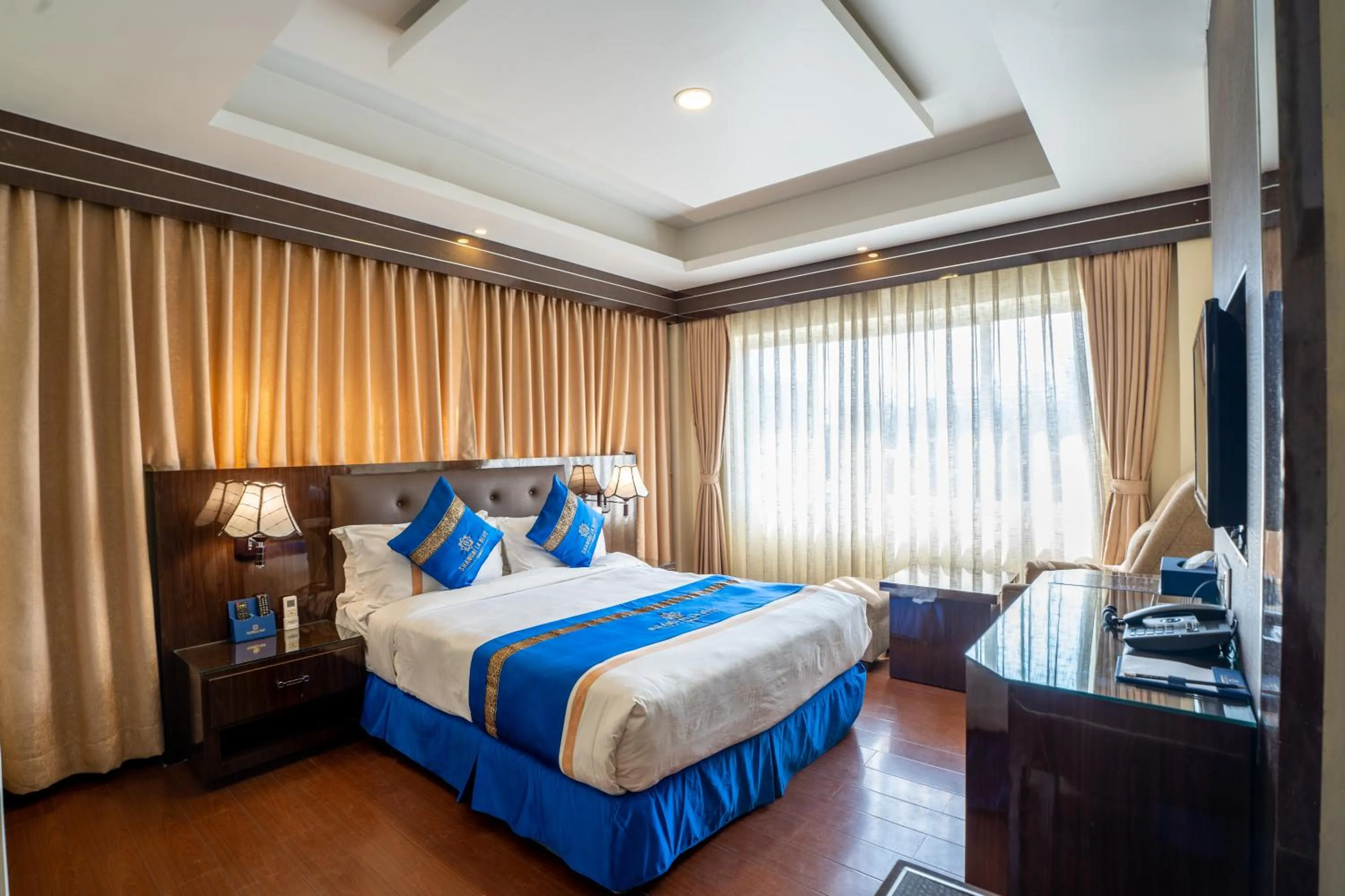 Bed in Shangrila Blu Hotel