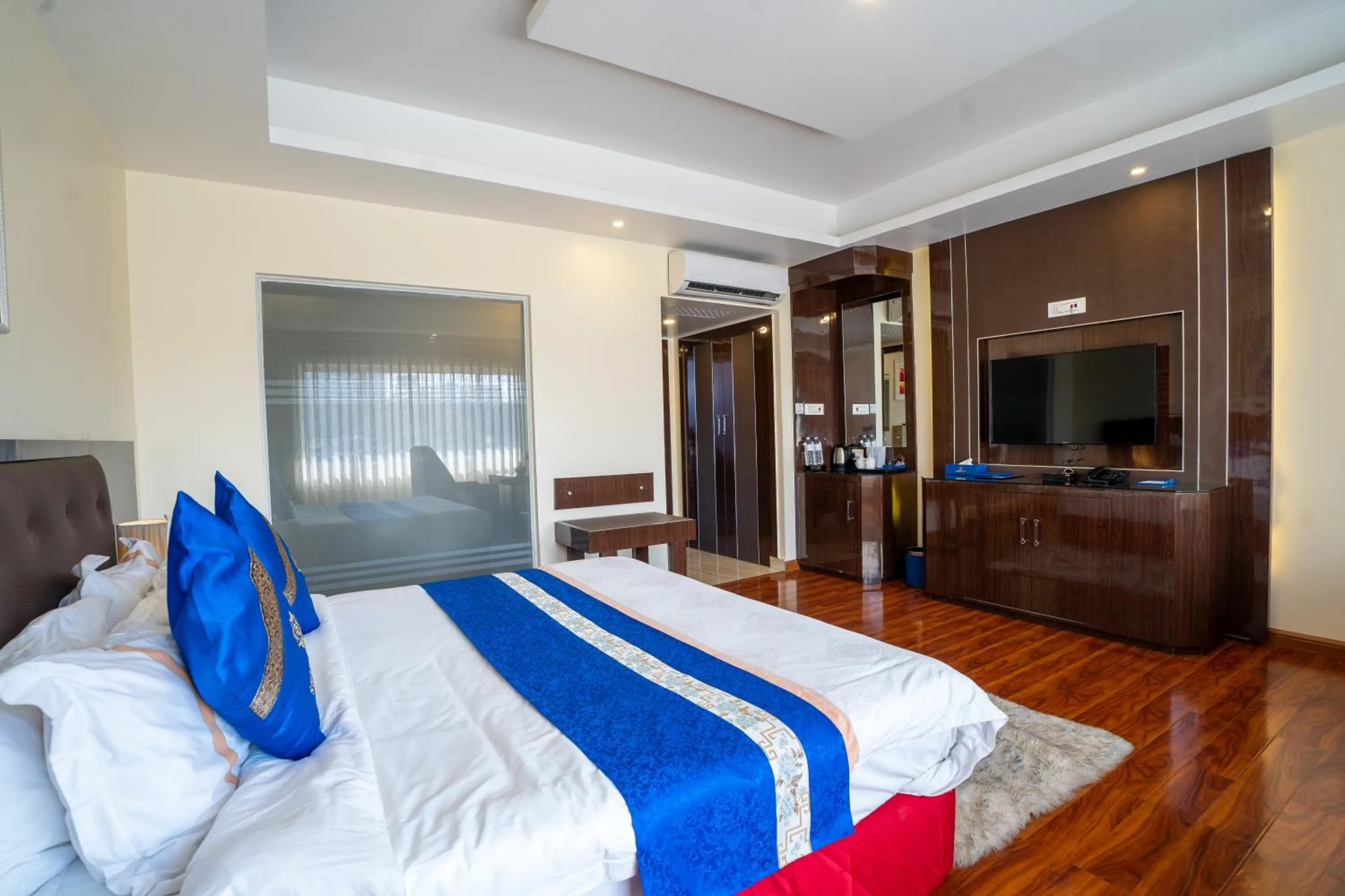 Photo of the whole room, Bed in Shangrila Blu Hotel