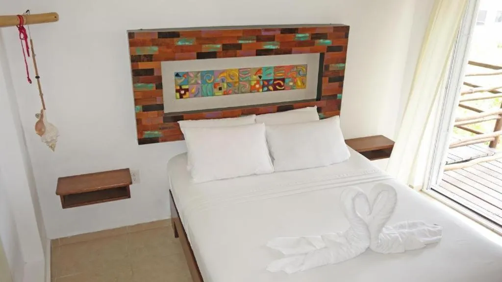 Bed in El Fuerte Beach Apartments
