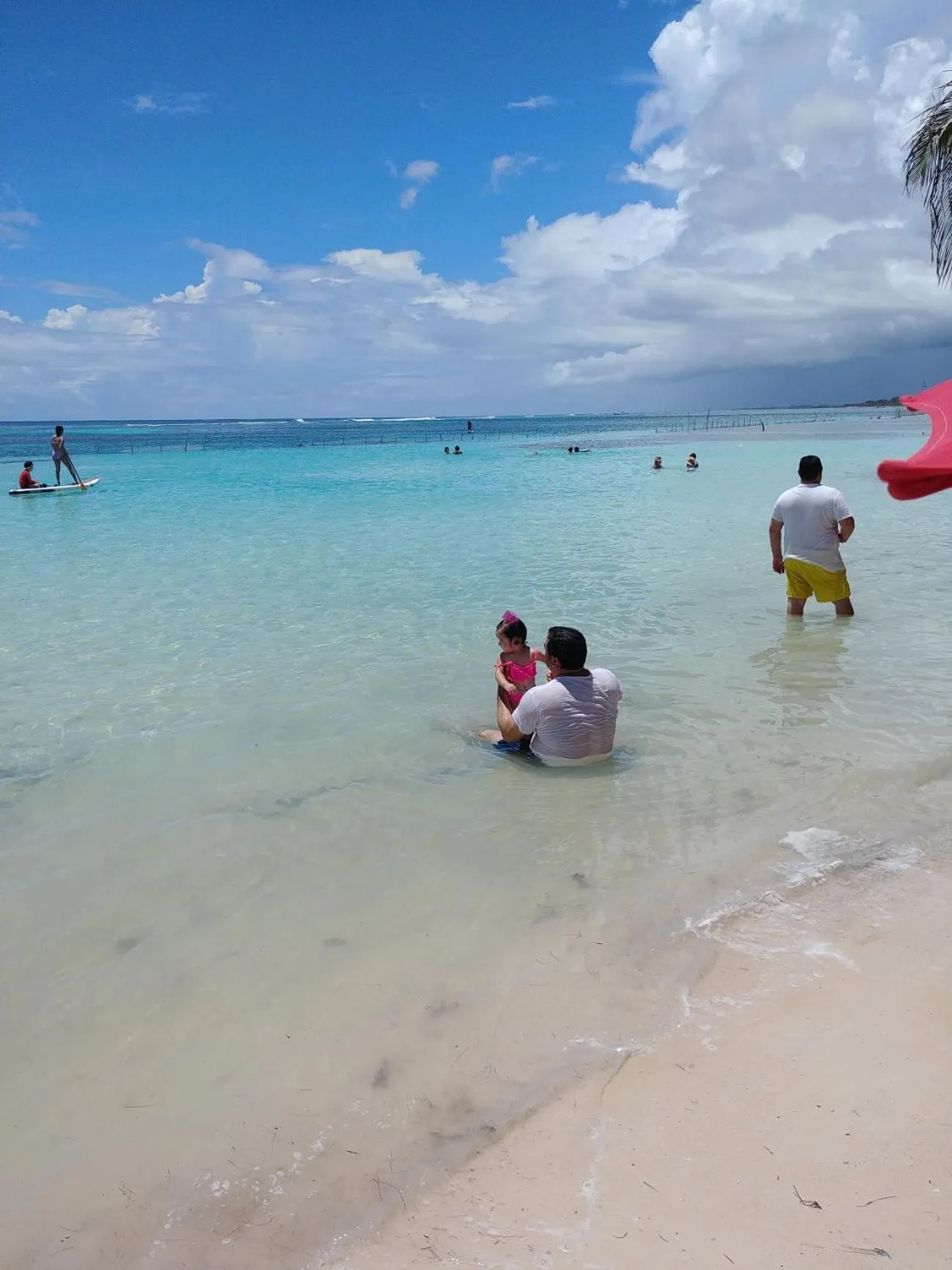People in El Fuerte Beach Apartments