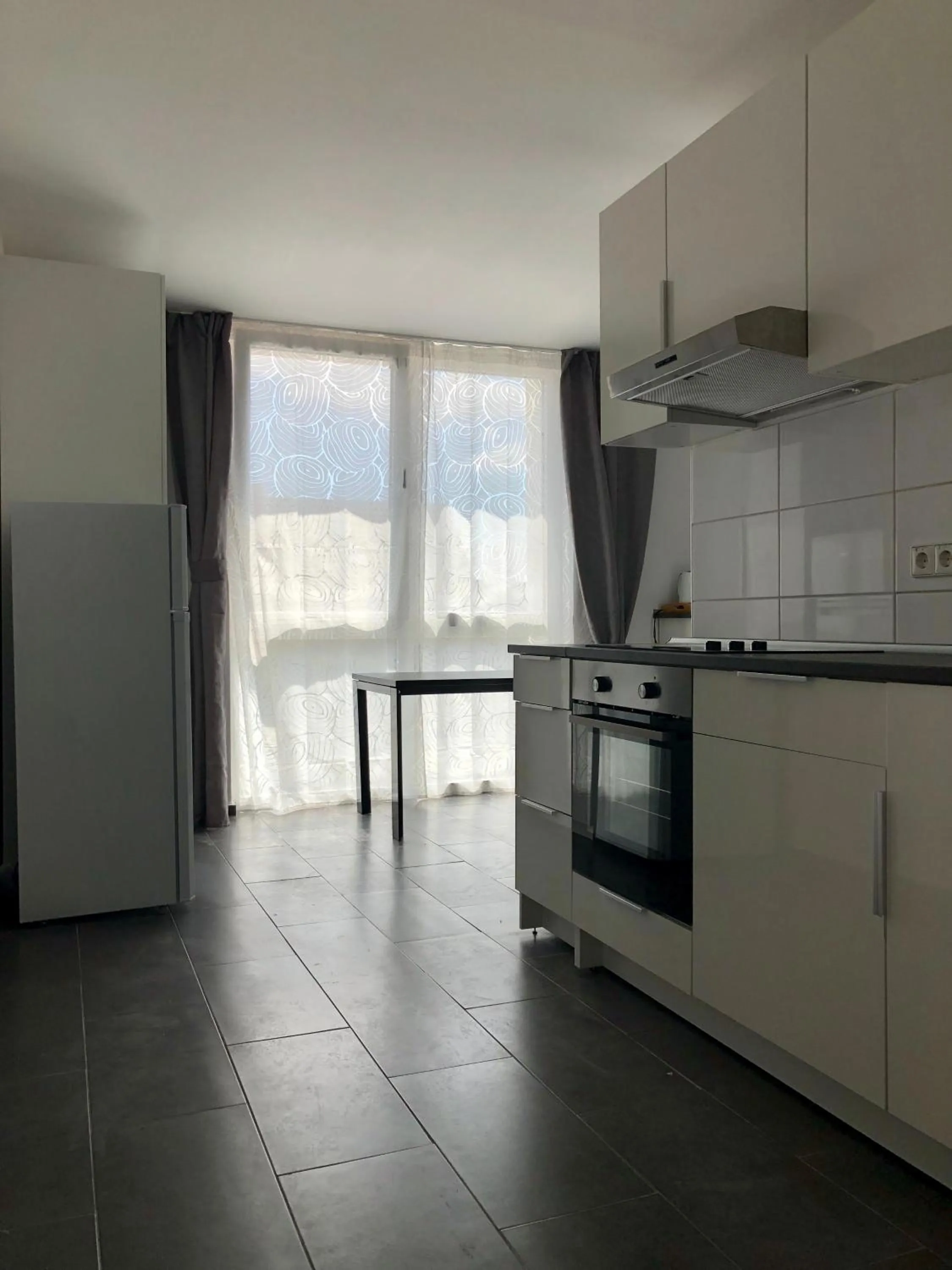 Kitchen or kitchenette in Libarty Appartments