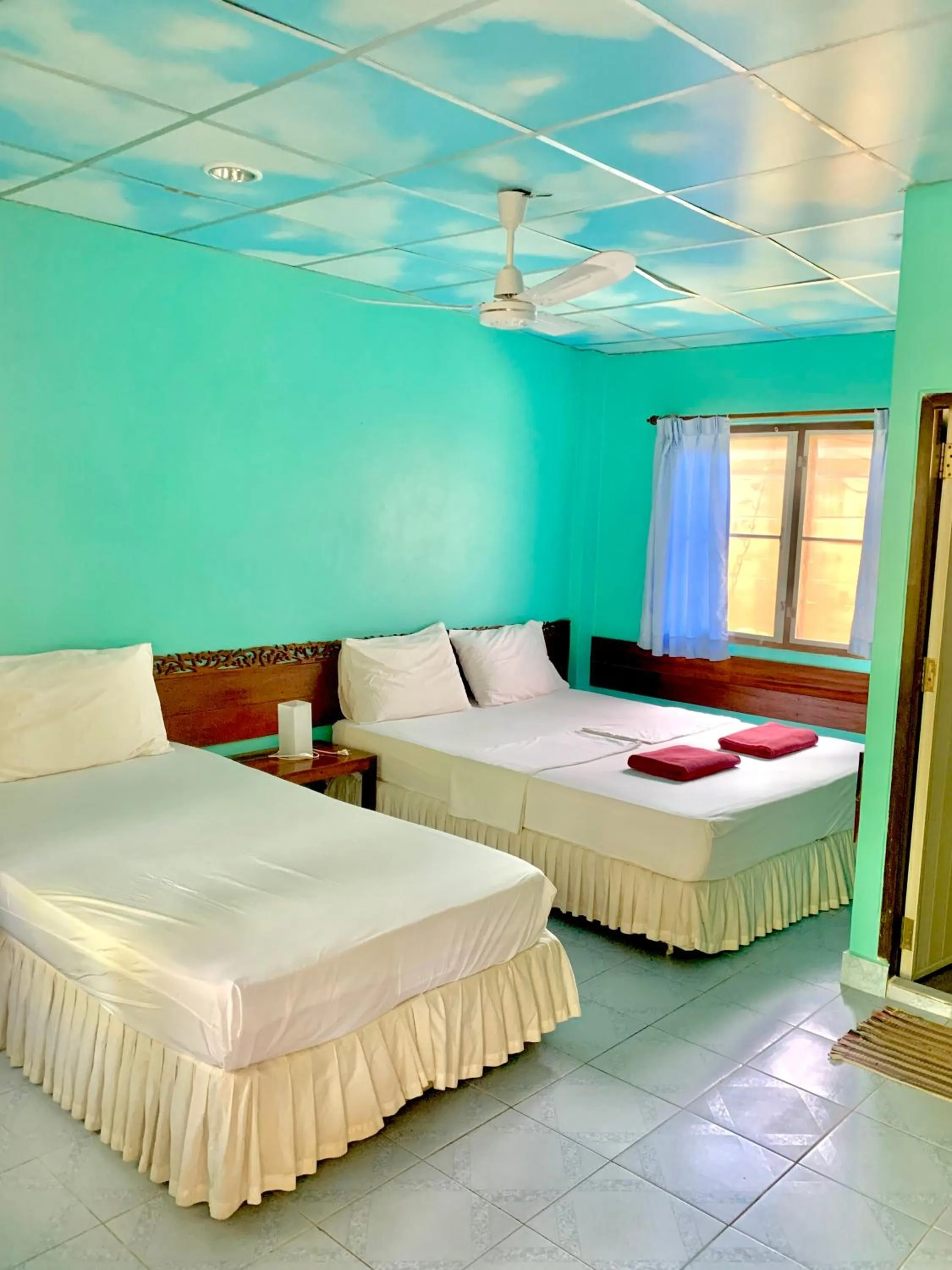 Bed in Koh Tao Tropicana Resort