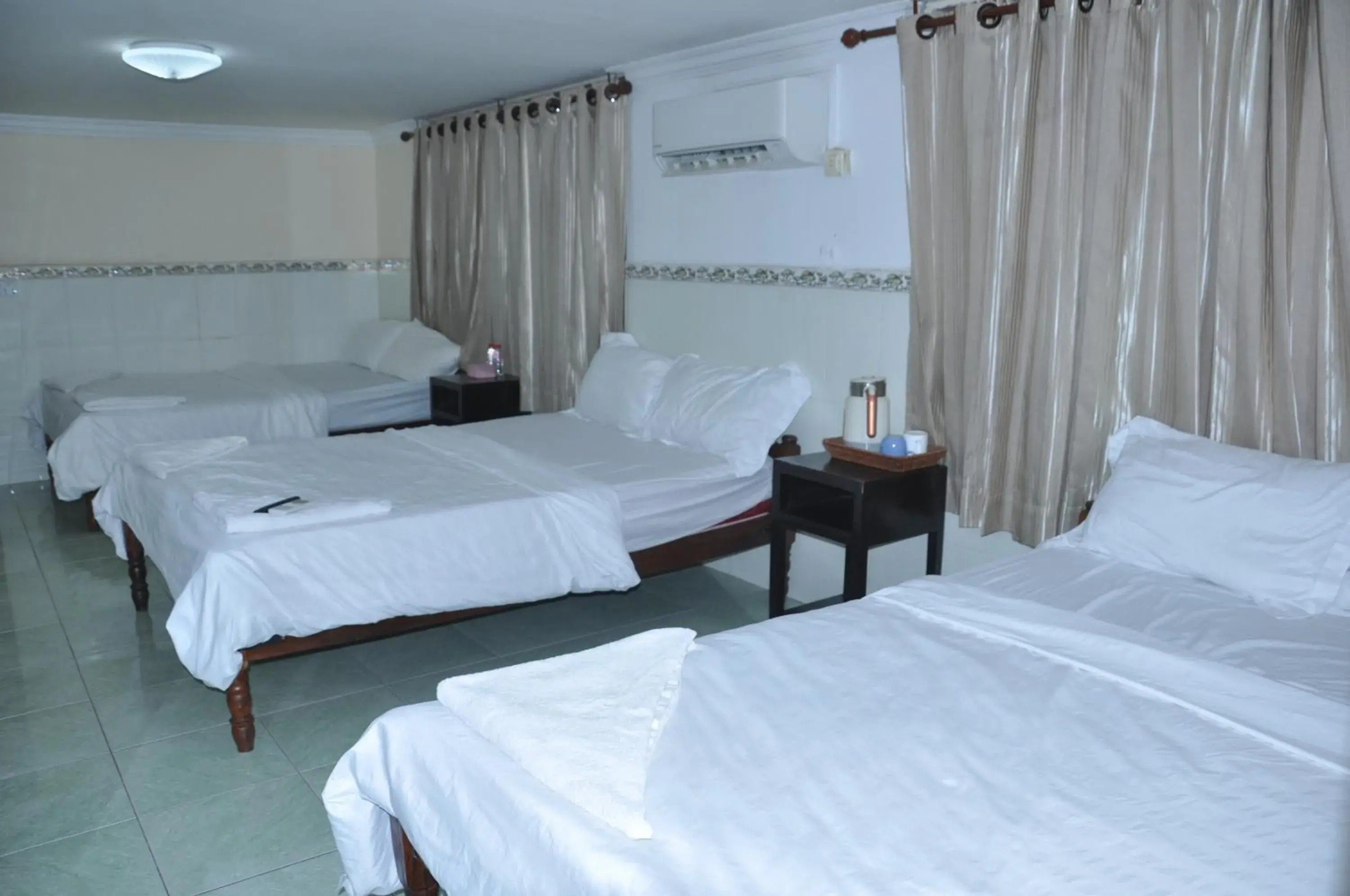 Bed in Velkommen Guesthouse Phnom Penh Bed in Velkommen Guesthouse Phnom Penh