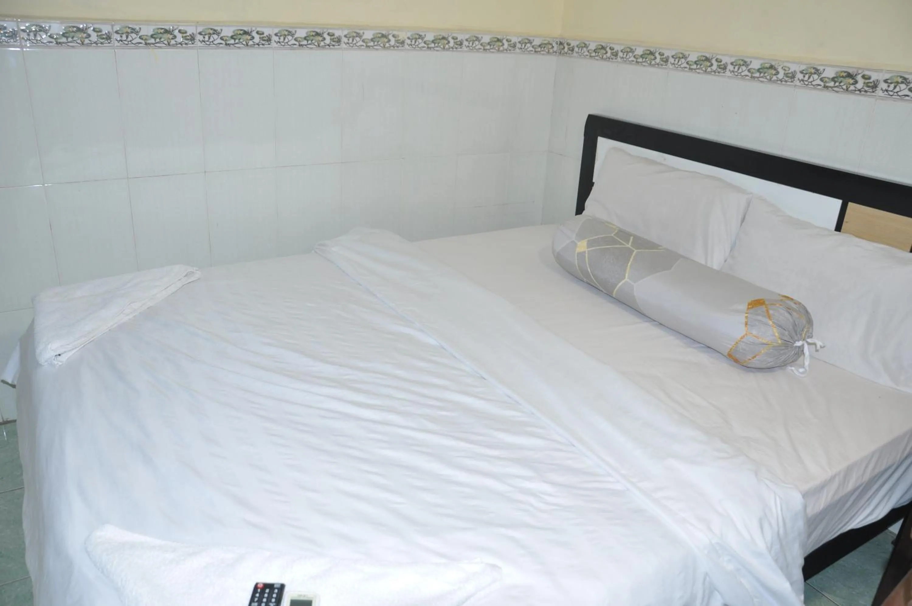 Bed in Velkommen Guesthouse Phnom Penh