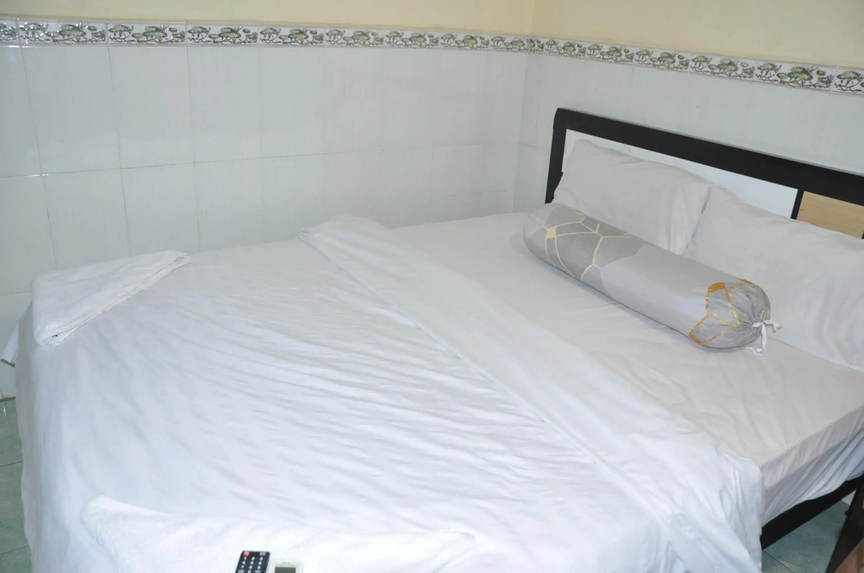 Bed in Velkommen Guesthouse Phnom Penh Bed in Velkommen Guesthouse Phnom Penh