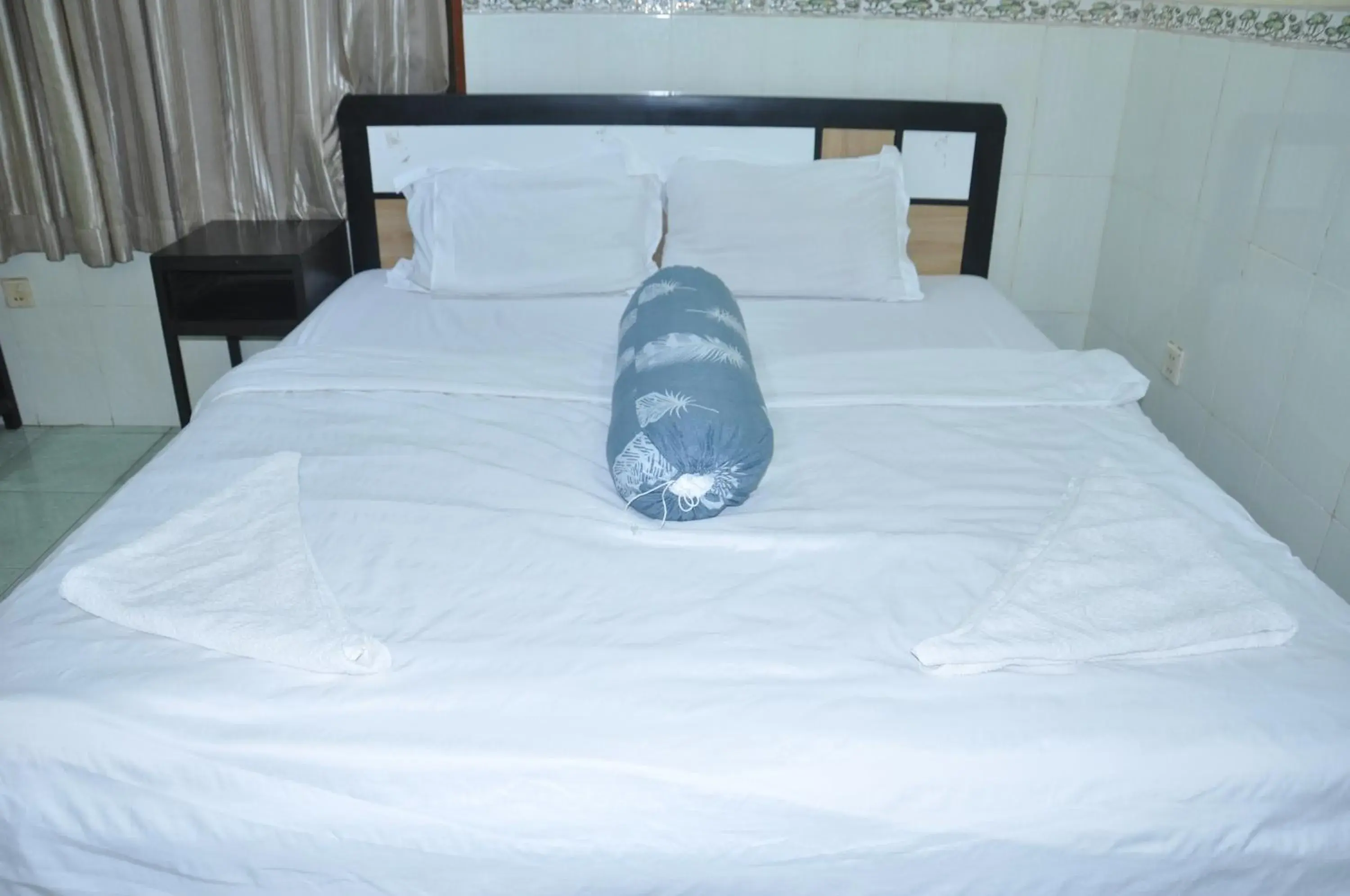 Bed in Velkommen Guesthouse Phnom Penh Bed in Velkommen Guesthouse Phnom Penh