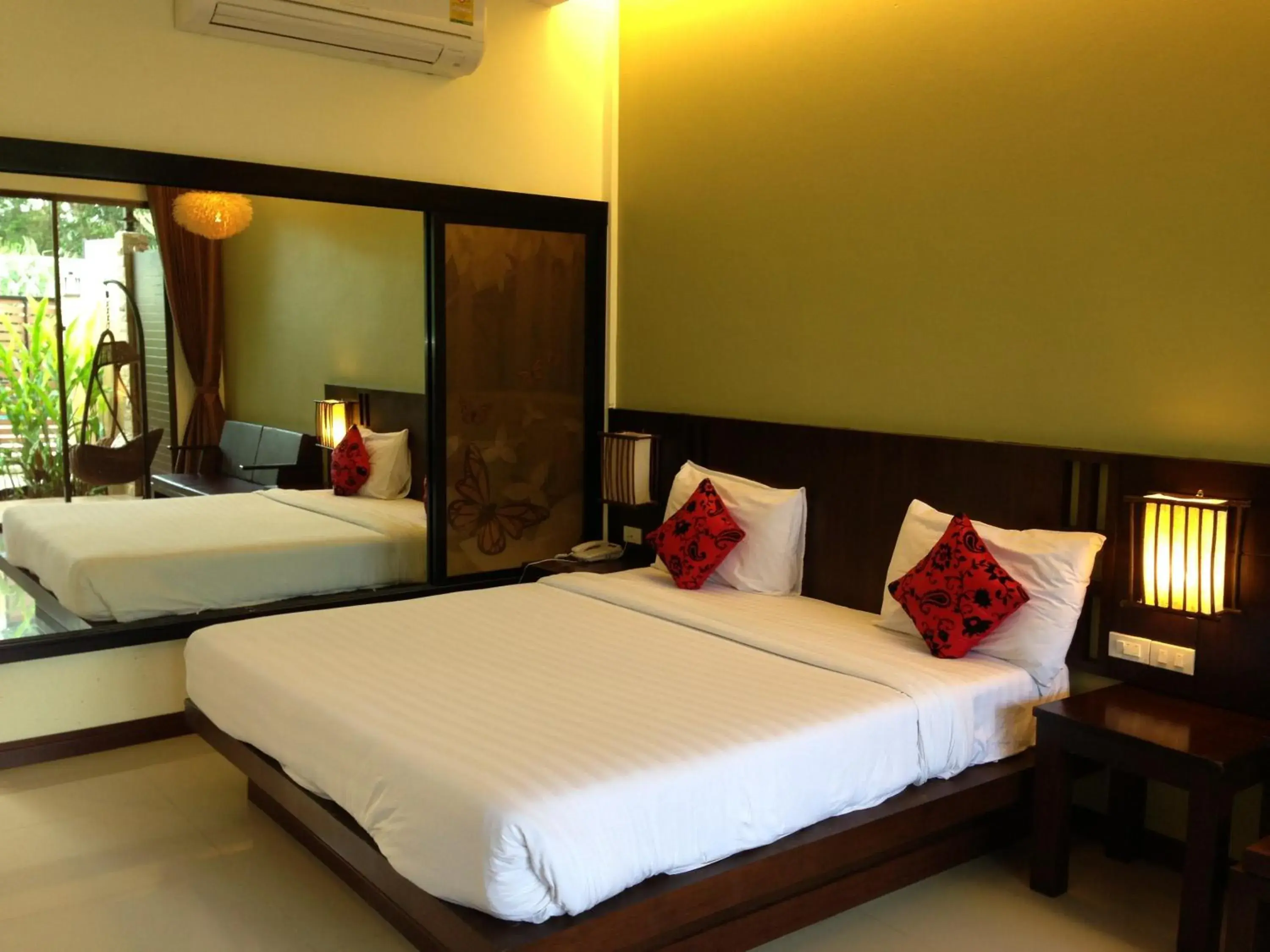 Bed in Palm Sweet Resort Bed in Palm Sweet Resort