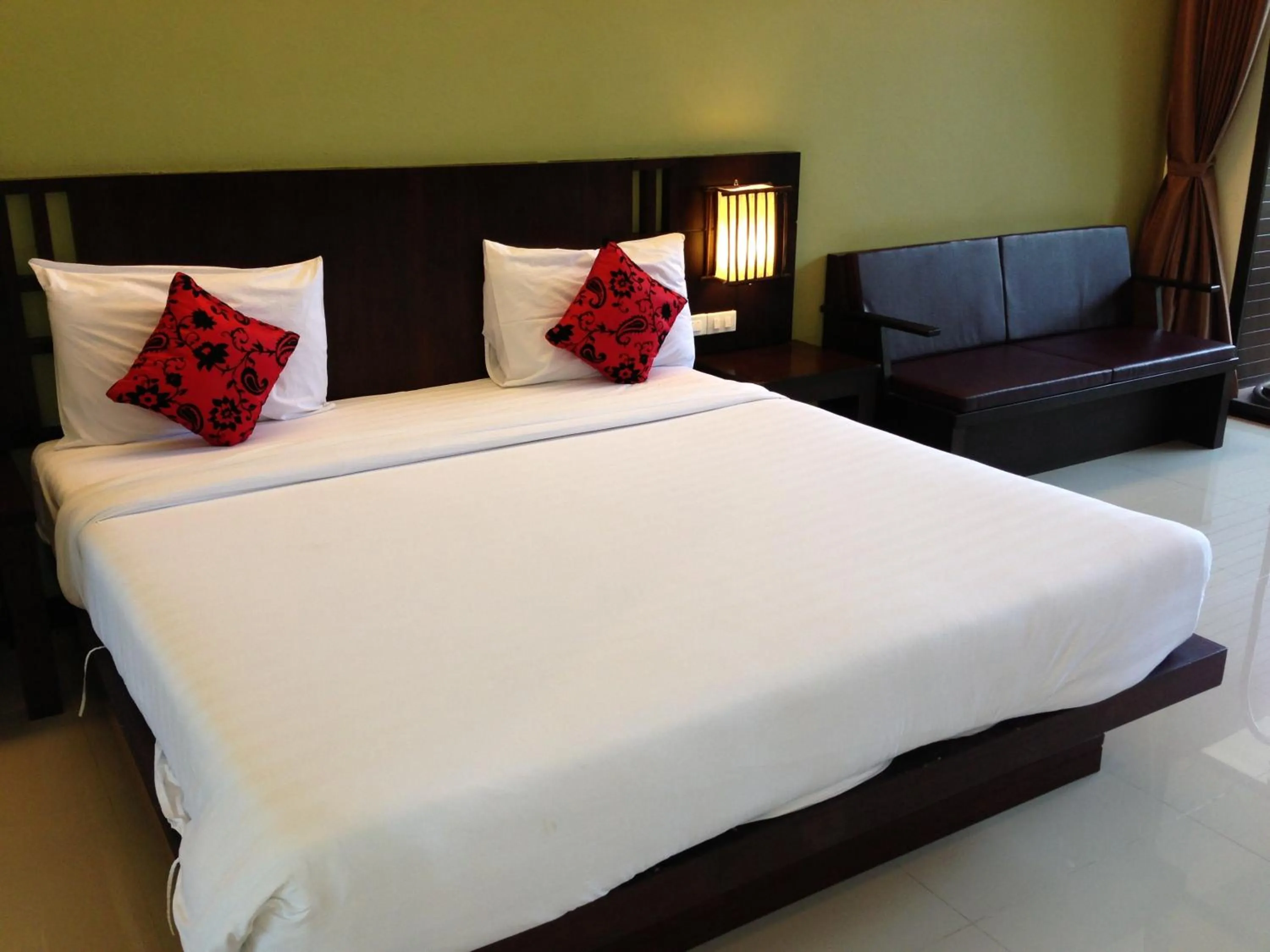 Bed in Palm Sweet Resort