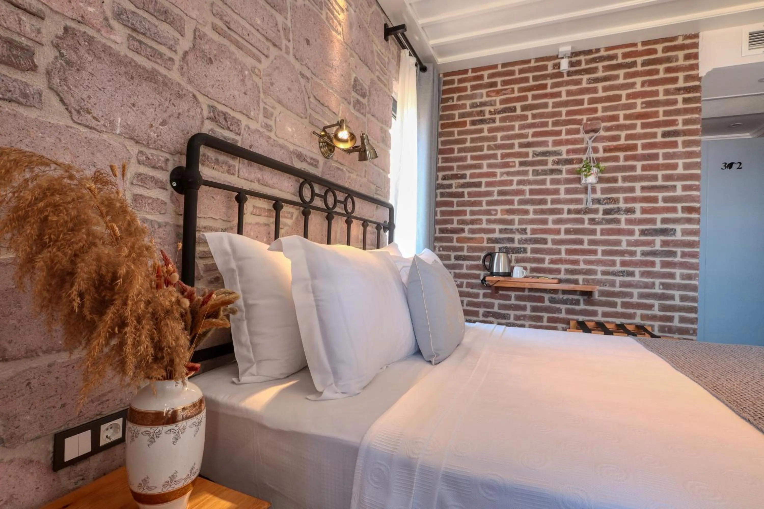 Bed in Sukha Cunda Otel