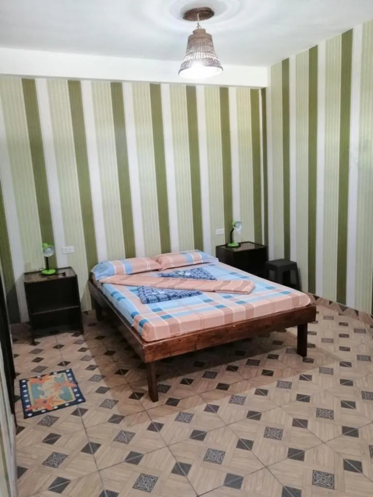 Bed in Eddie`s Beach Resort Siargao