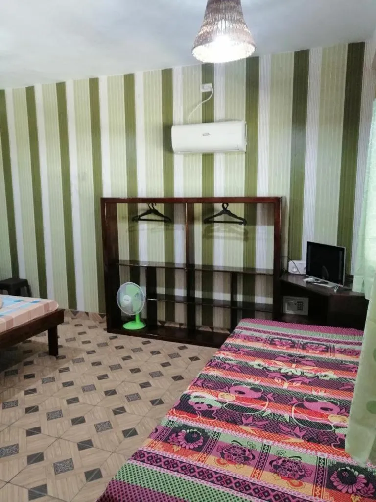 Bed in Eddie`s Beach Resort Siargao