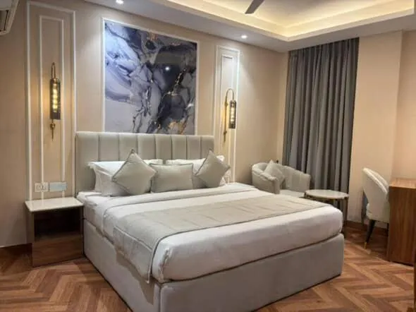 Bed in Airport Hotel Ramhan Palace Mahipalpur