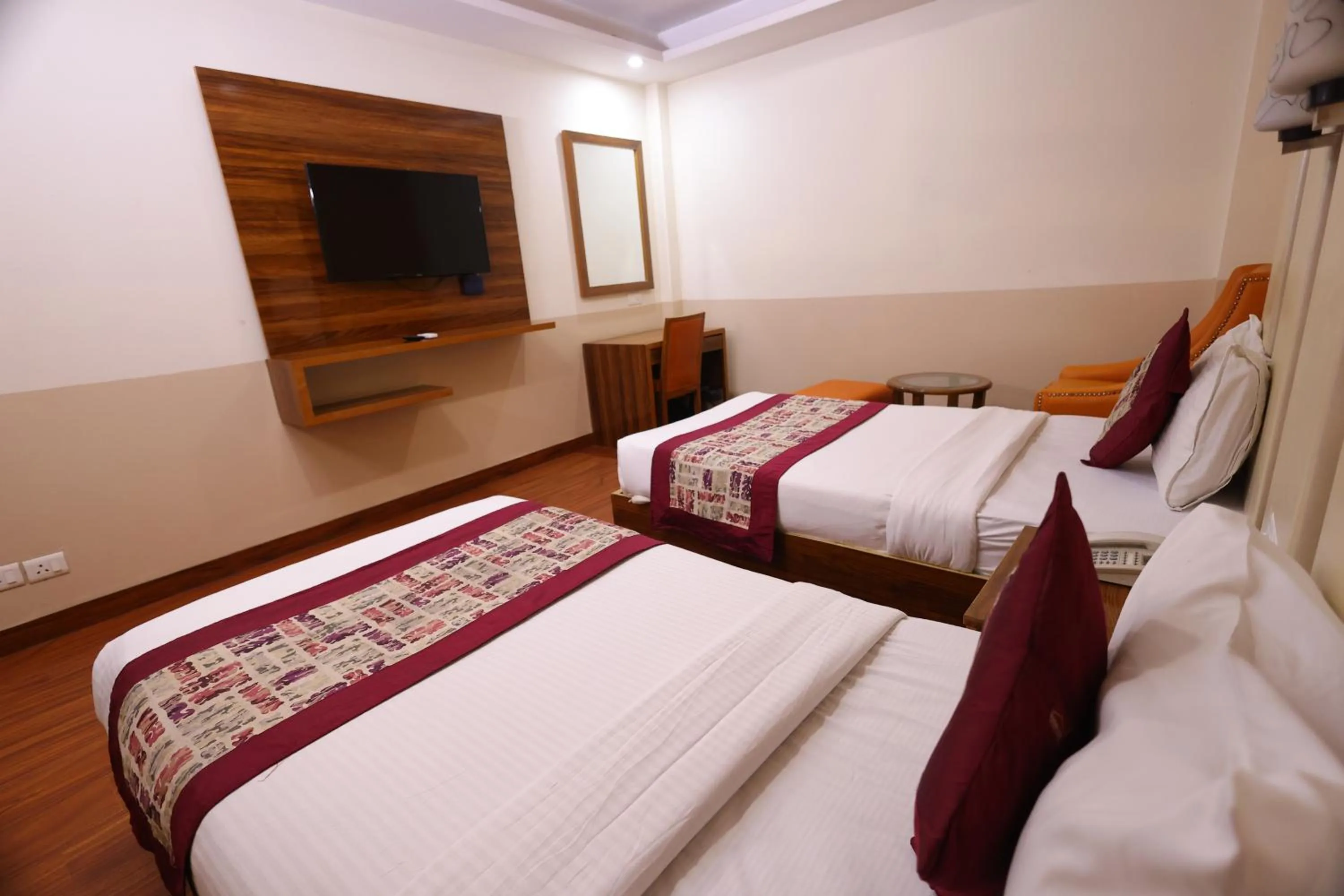 Bed in Airport Hotel Ramhan Palace Mahipalpur