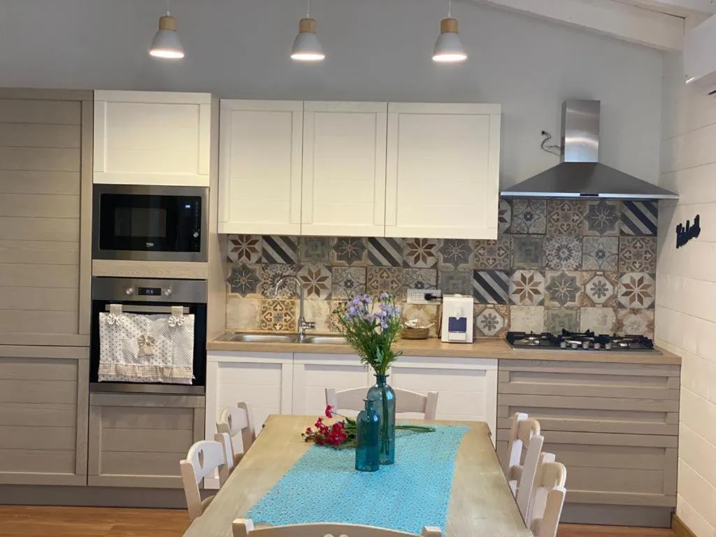 Kitchen or kitchenette in Country House S'Ozzastru