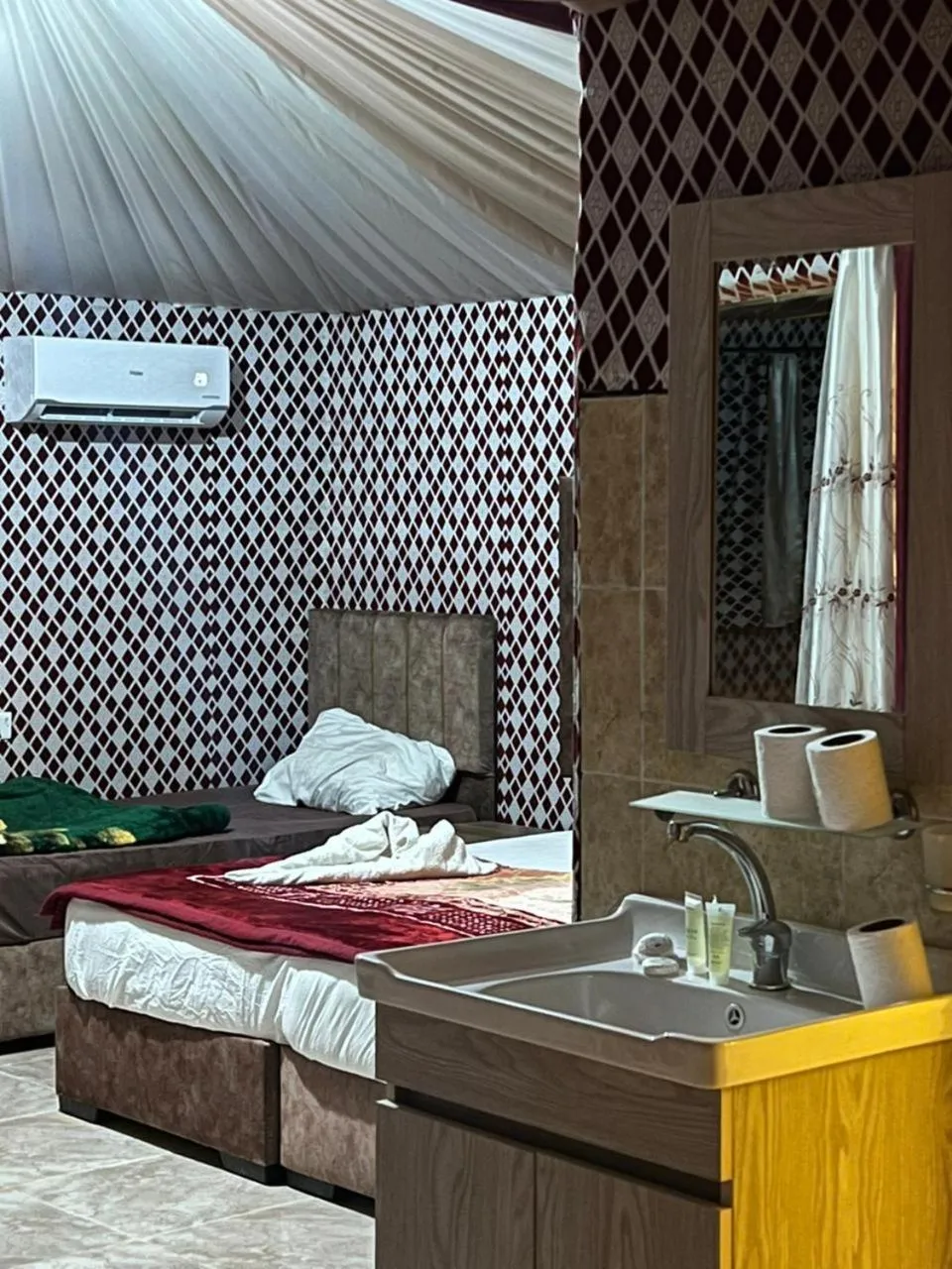 Bed in Traditions of Wadi Rum camp & jeep tour