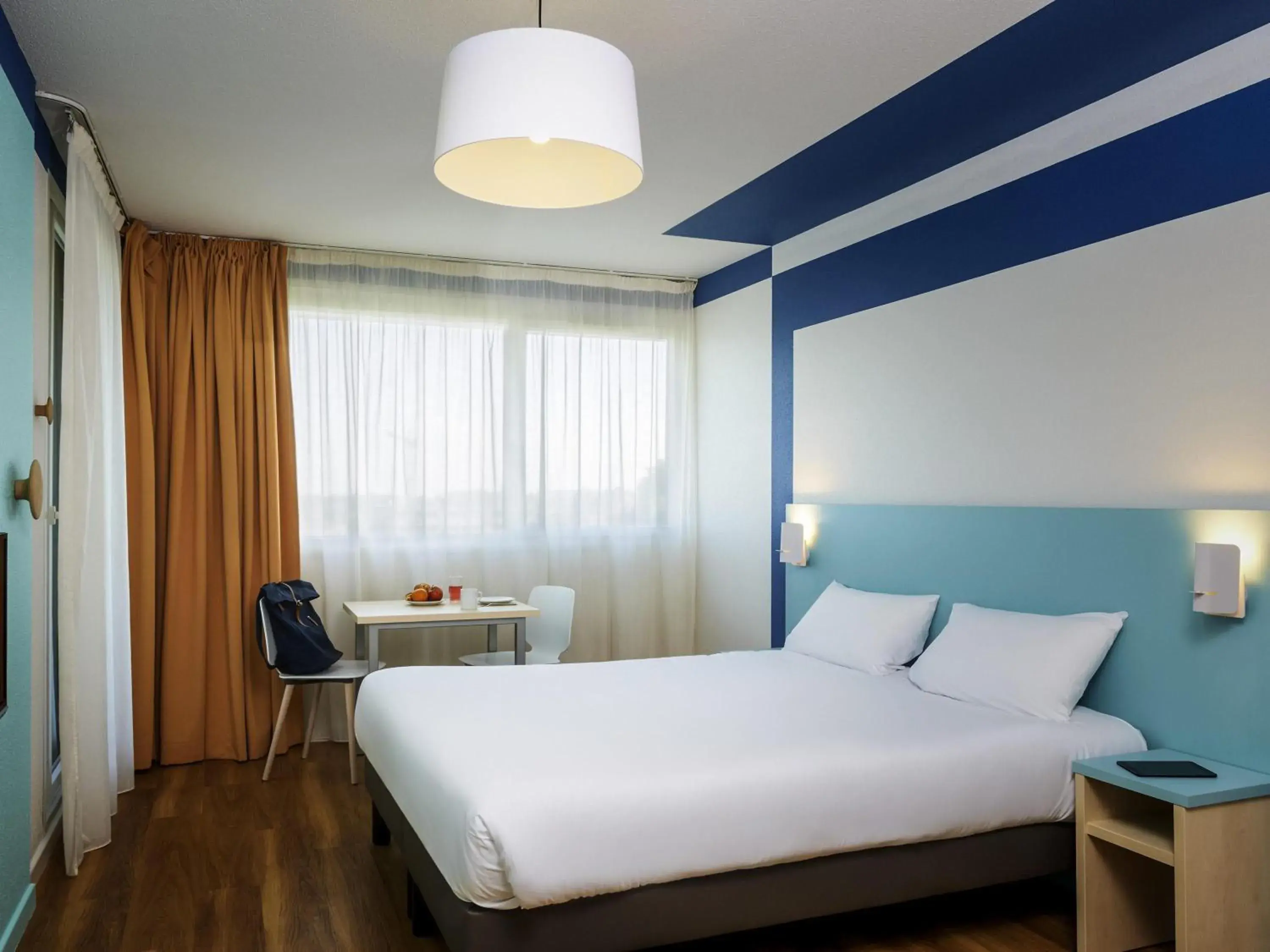 Bedroom, Bed in Aparthotel Adagio Access Strasbourg Illkirch Bedroom, Bed in Aparthotel Adagio Access Strasbourg Illkirch