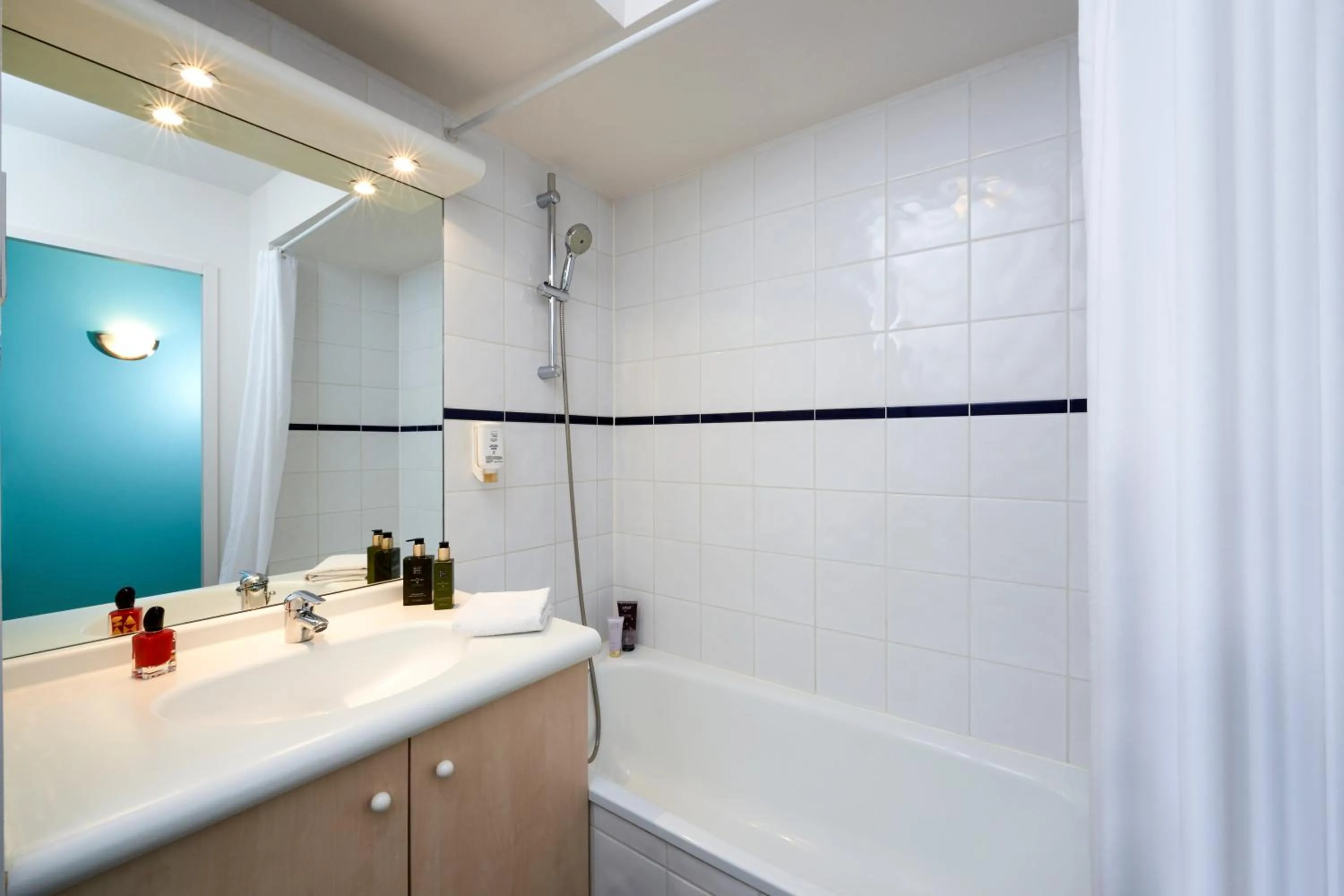 Bathroom in Aparthotel Adagio Access Strasbourg Illkirch
