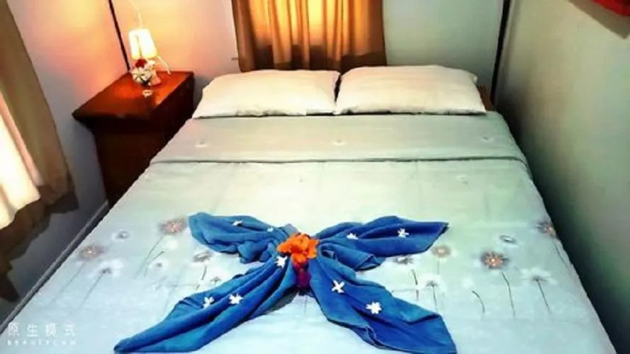 Bed in Najjamee Bungalows