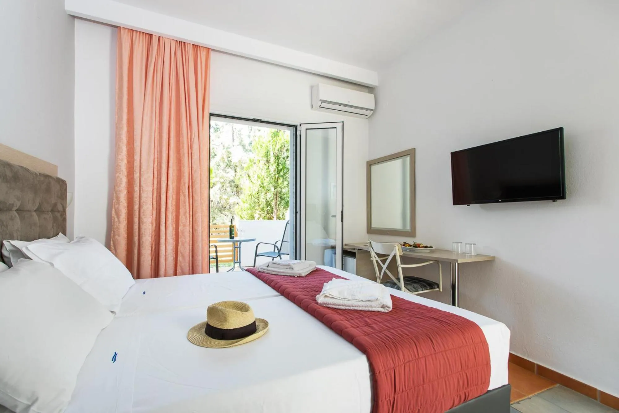 Photo of the whole room in Coral Blue Beach Hotel Gerakini