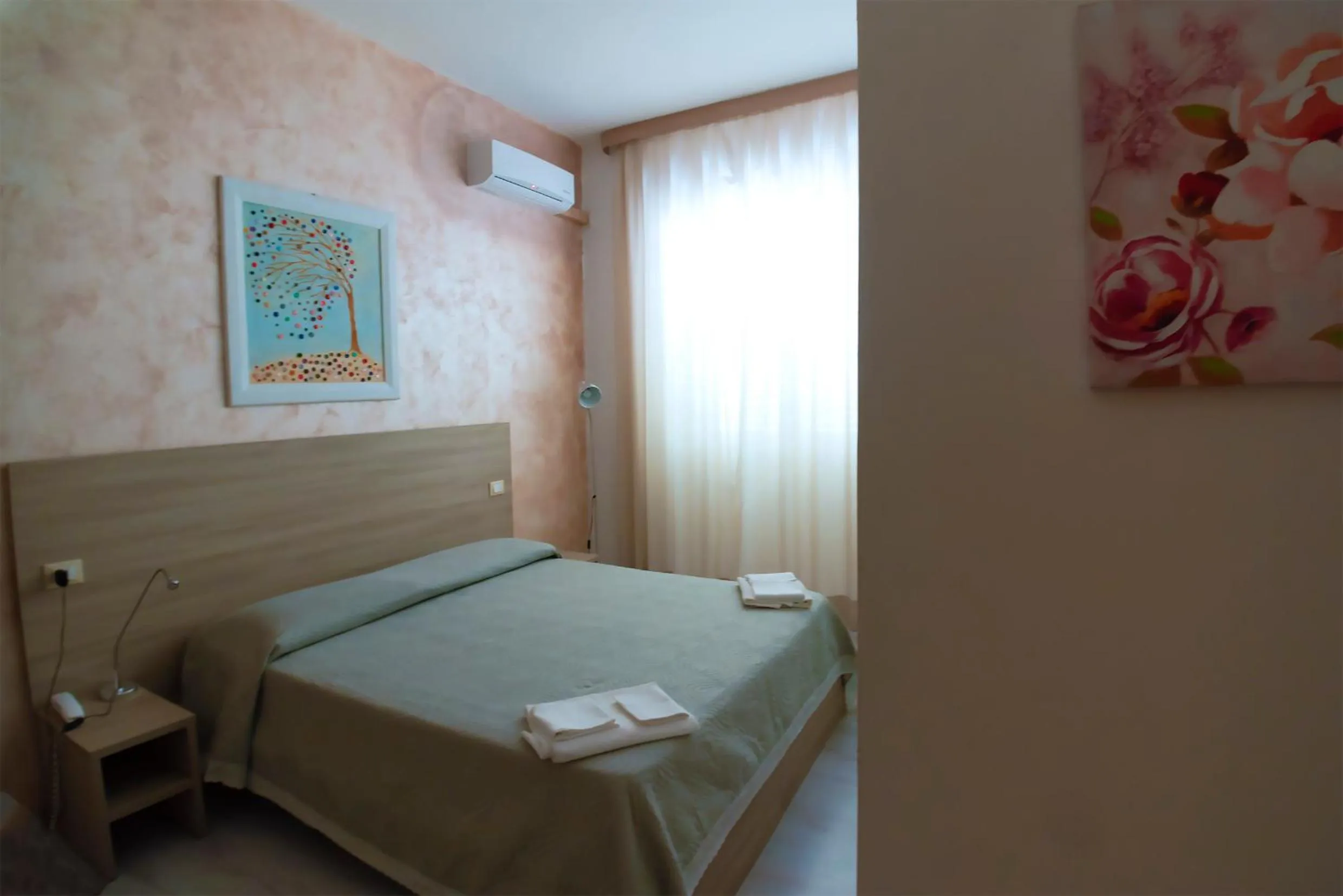 Bed in Hotel Sabatino