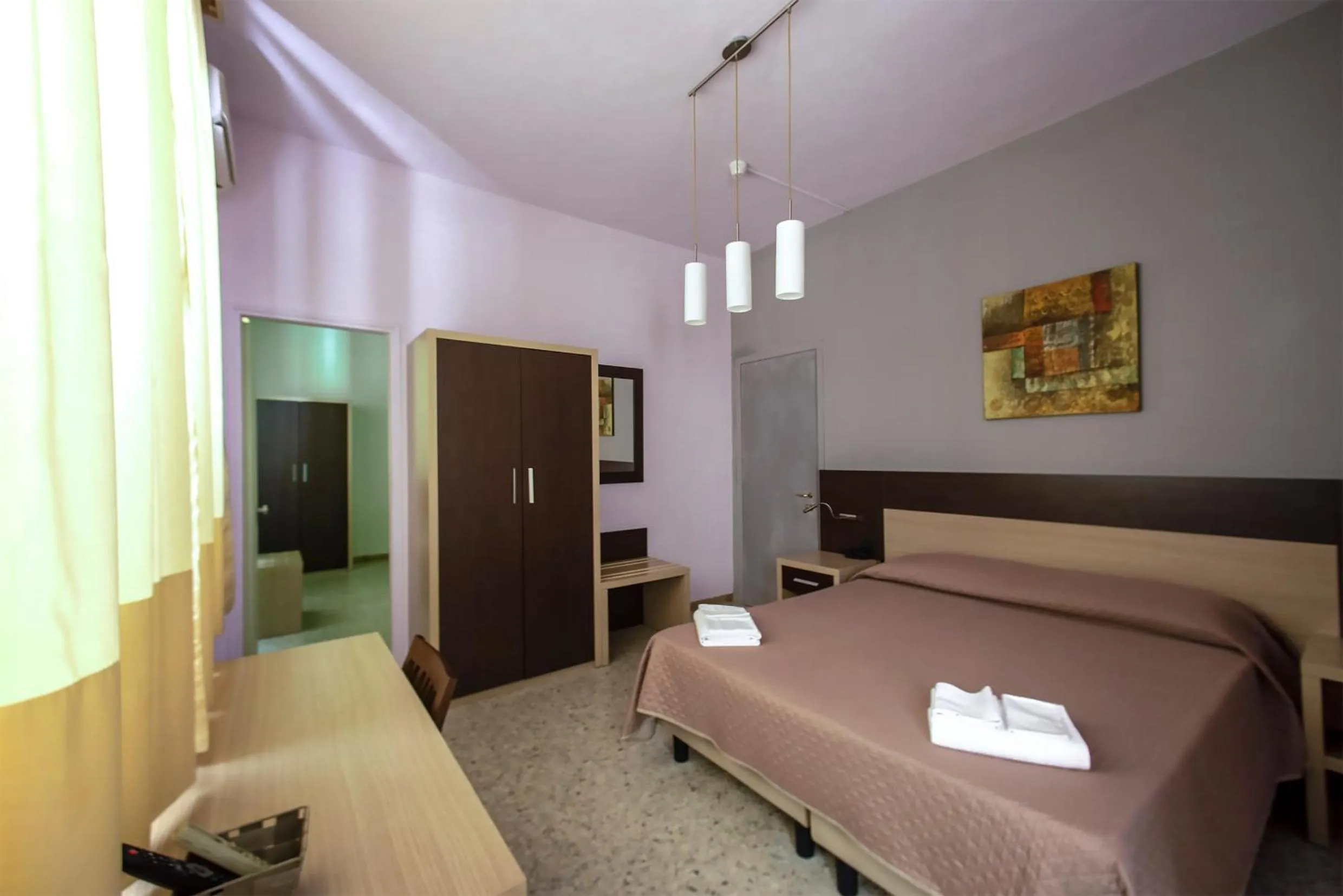 Bed in Hotel Sabatino