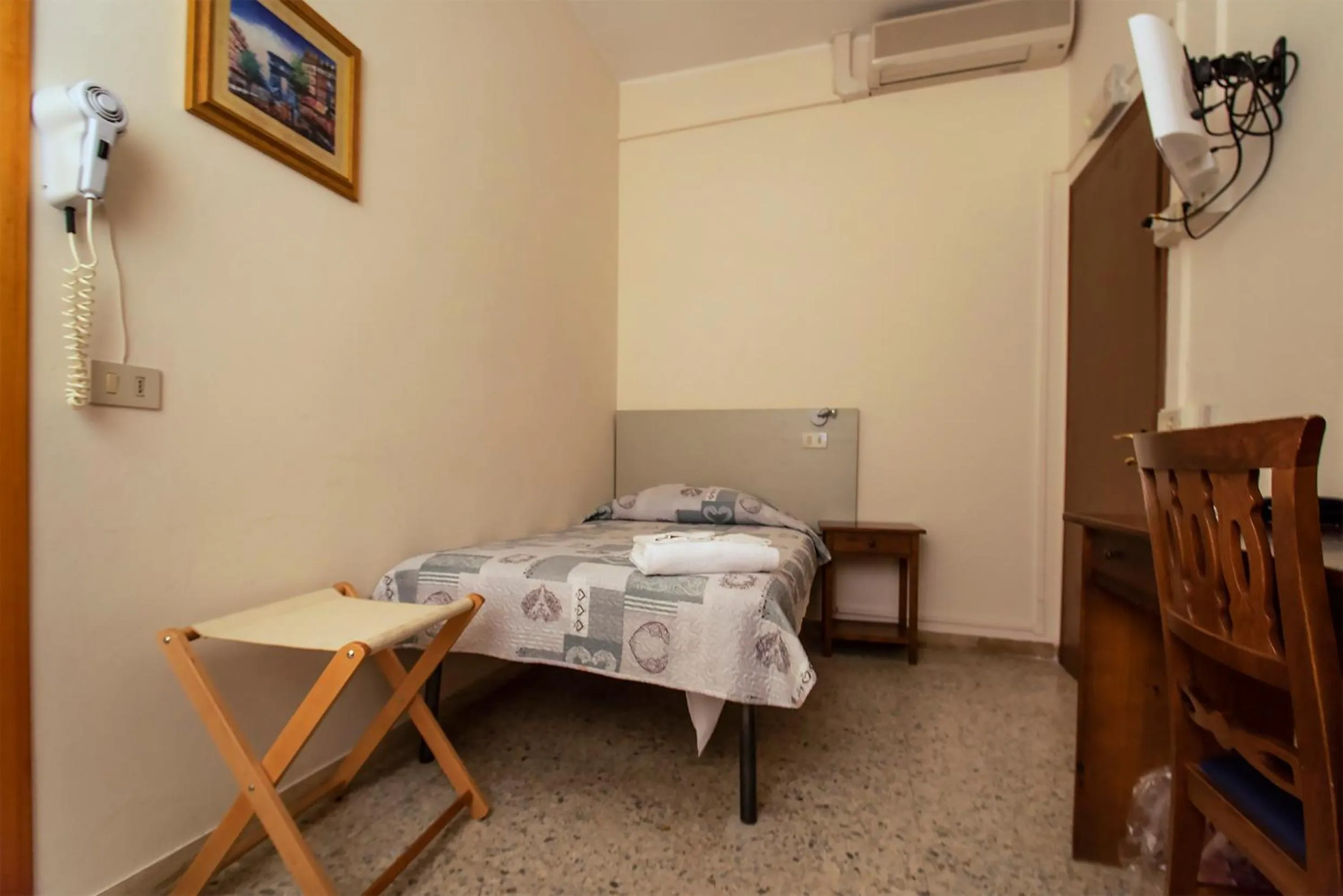 Bed in Hotel Sabatino