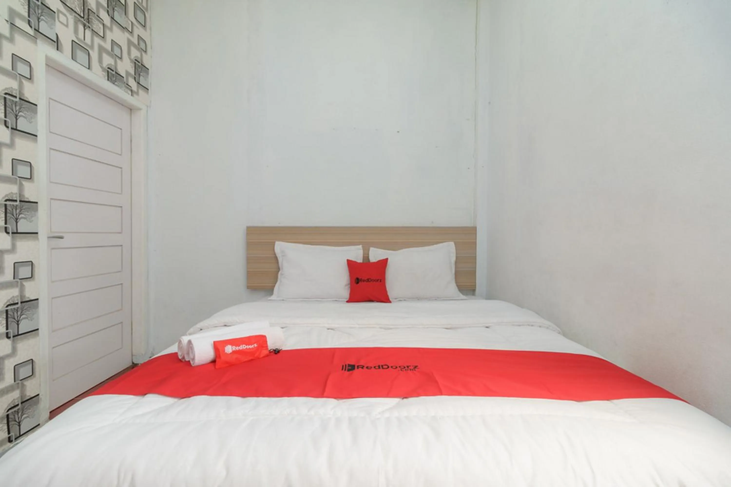 Bed in RedDoorz Syariah near Paradiso Beach Sabang