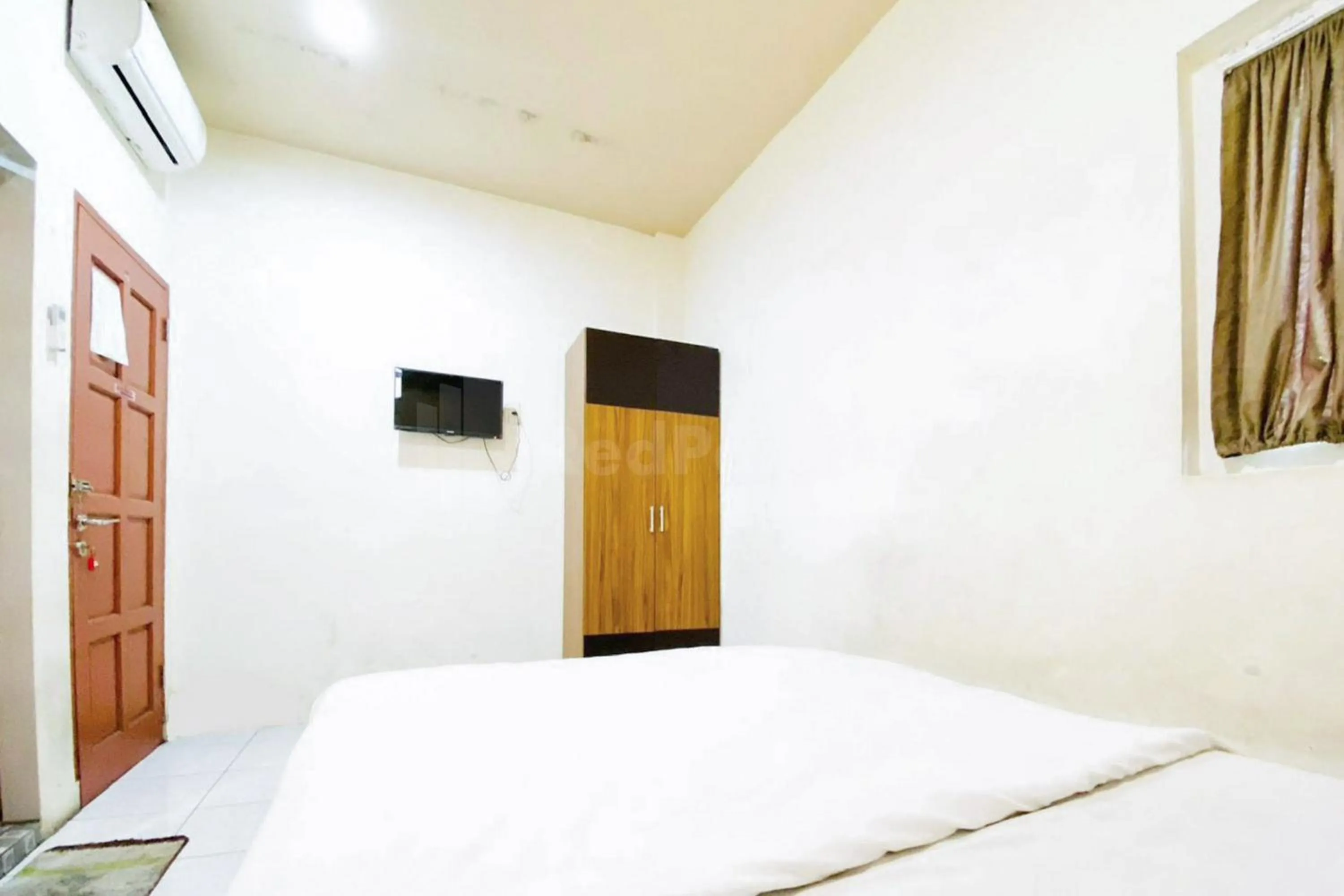 Bed in Palem Mas Garden RedPartner