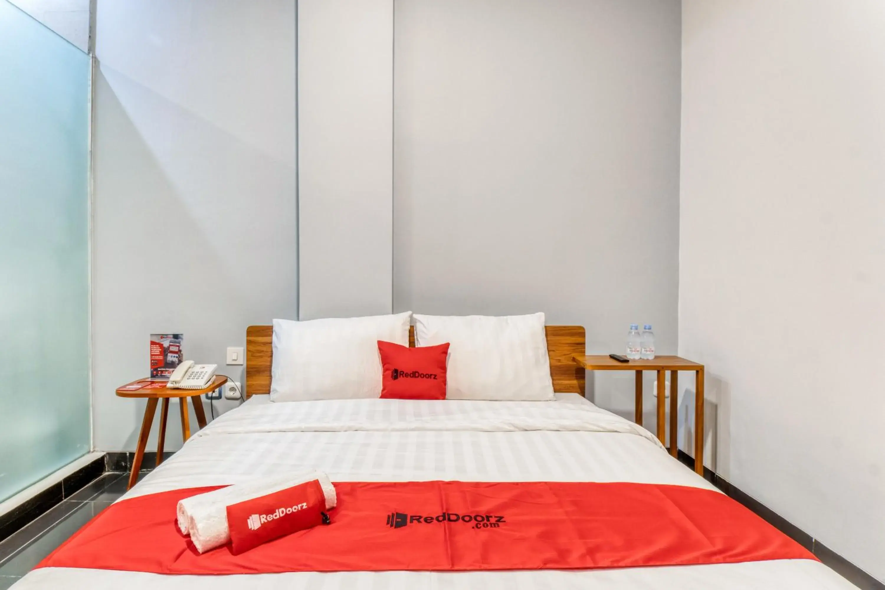 Bed in RedDoorz Plus near Taman Ismail Marzuki Bed in RedDoorz Plus near Taman Ismail Marzuki