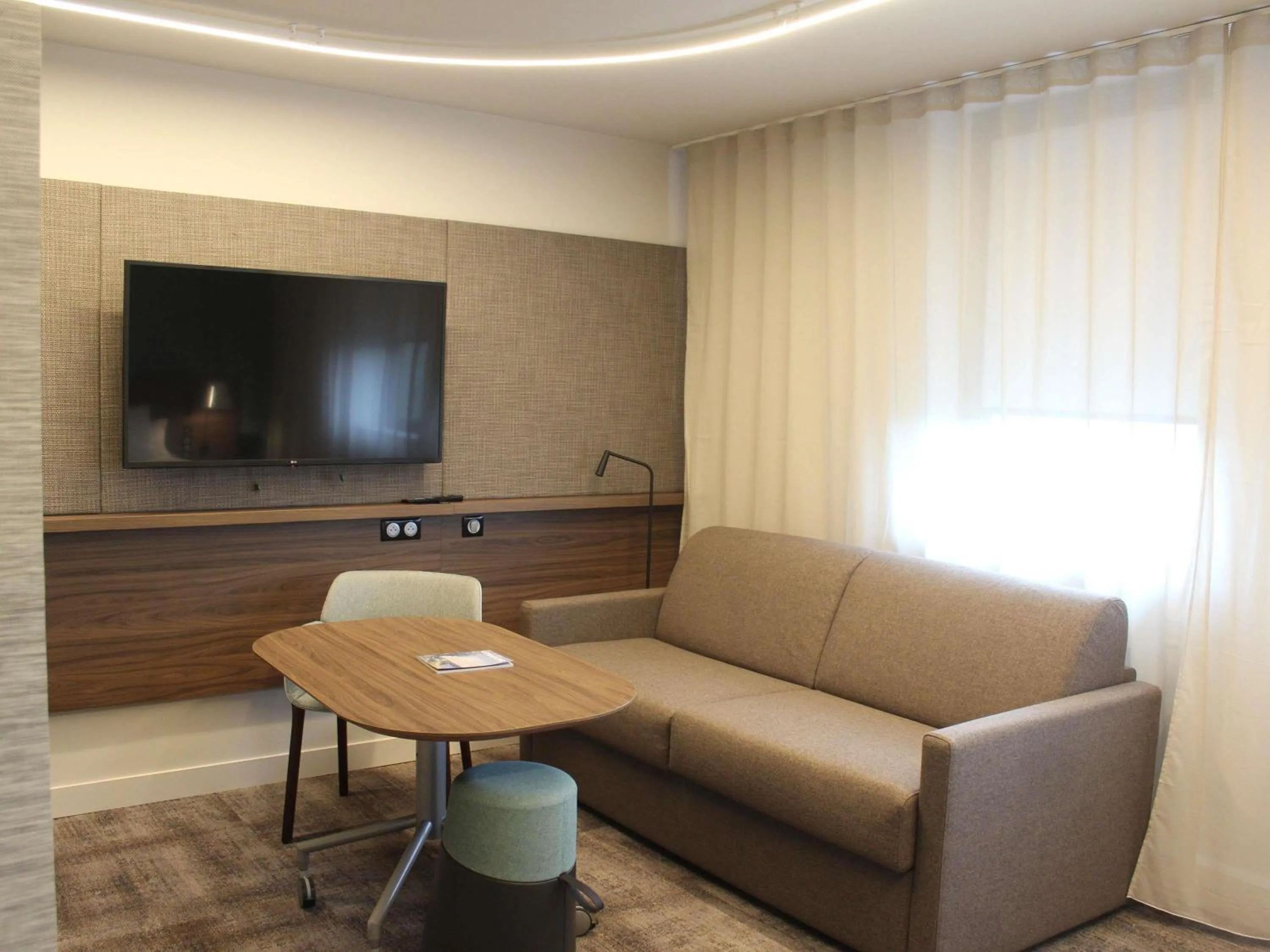 Bedroom in Novotel Suites Rouen Normandie