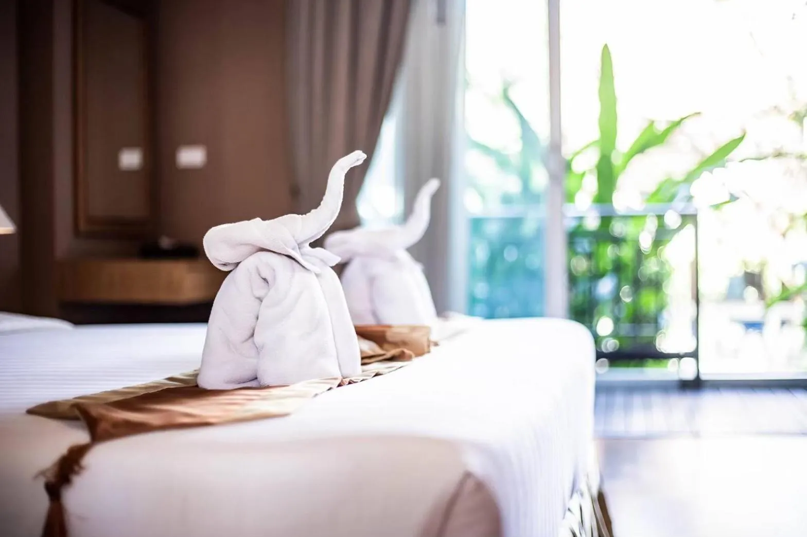 towels, Bed in Khammon Lanna Resort Chiang Mai