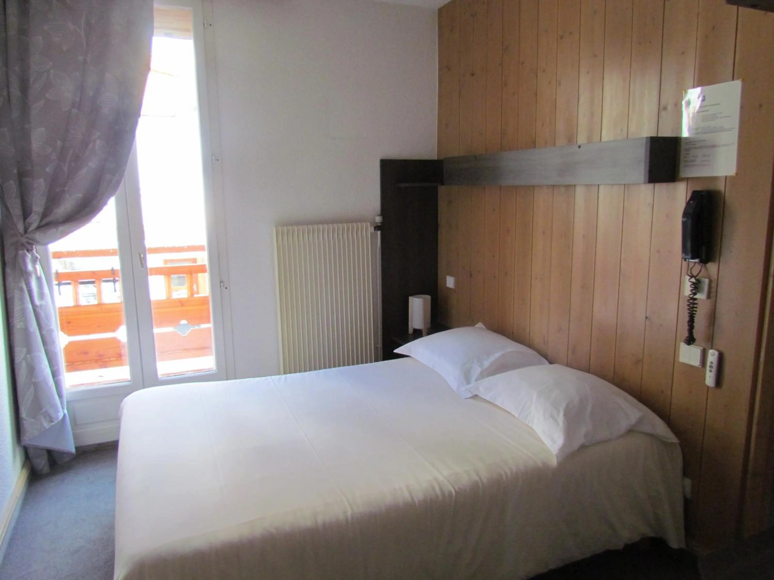 Bed in Hotel Val Joly