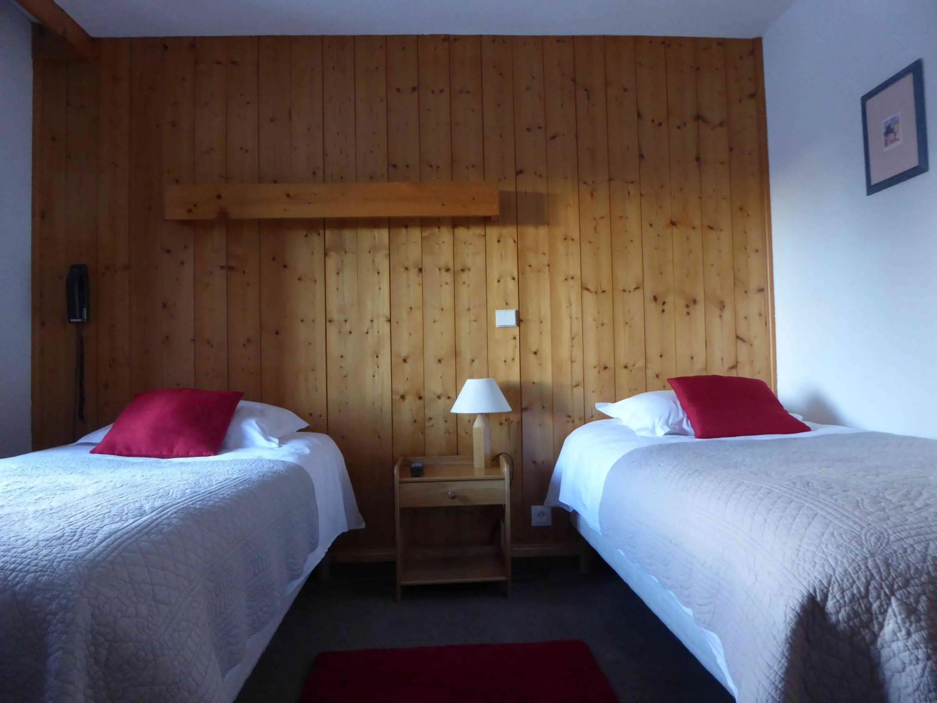 Bed in Hotel Val Joly