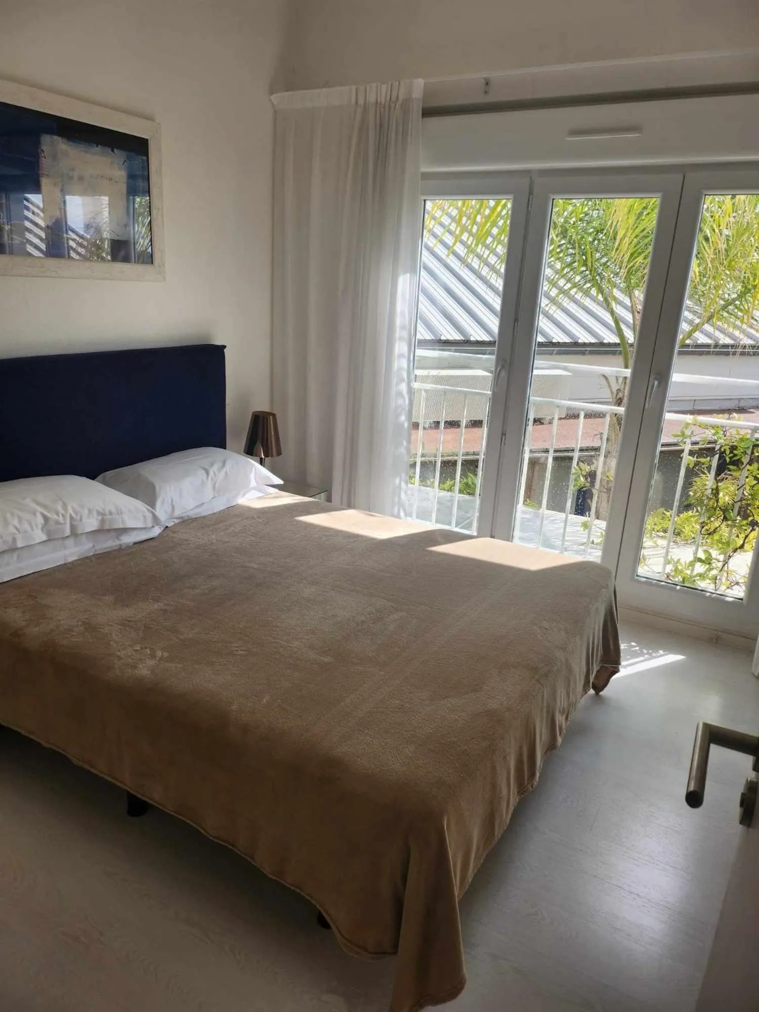 Bed in Bleu Mer Duplex & Suites