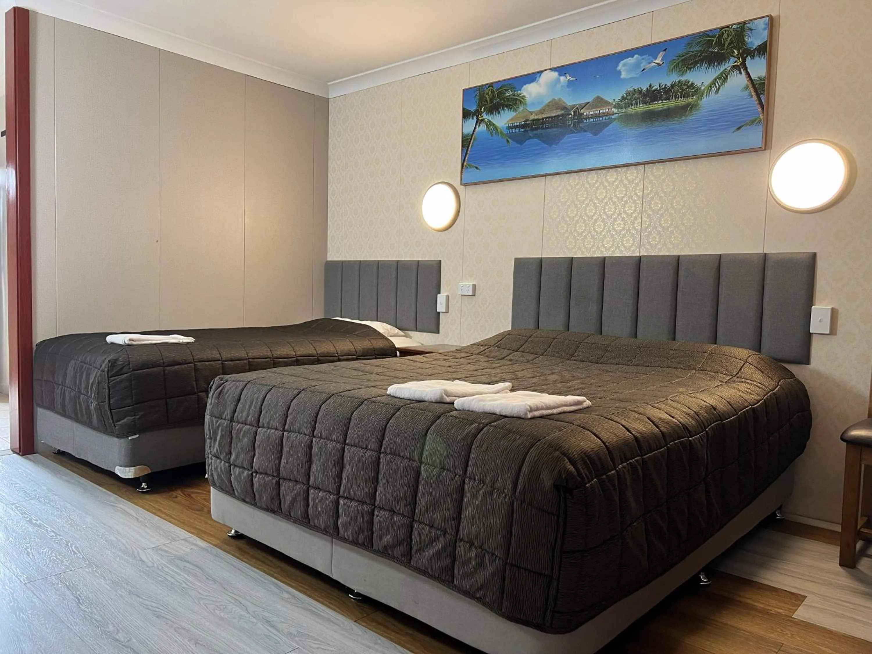 Bed in Central Jetty Motel