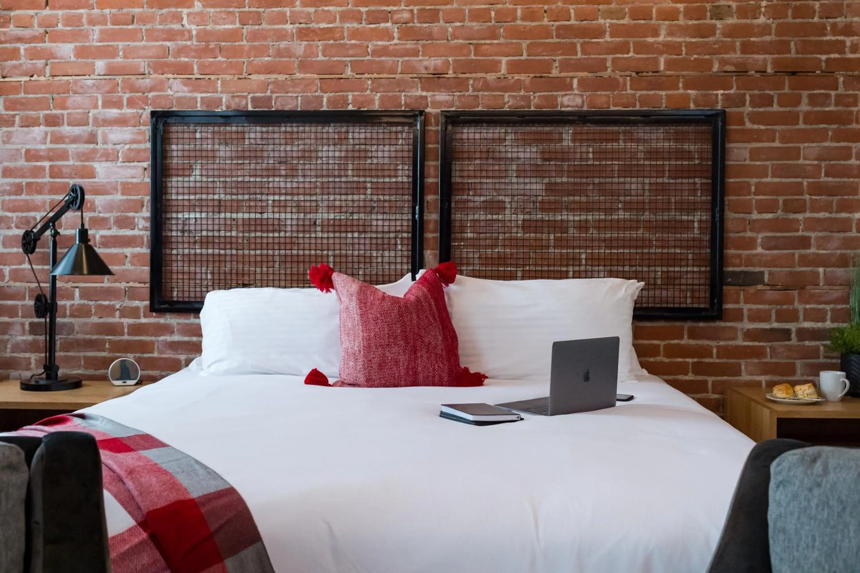 Bed in 48 King West Boutique Hotel