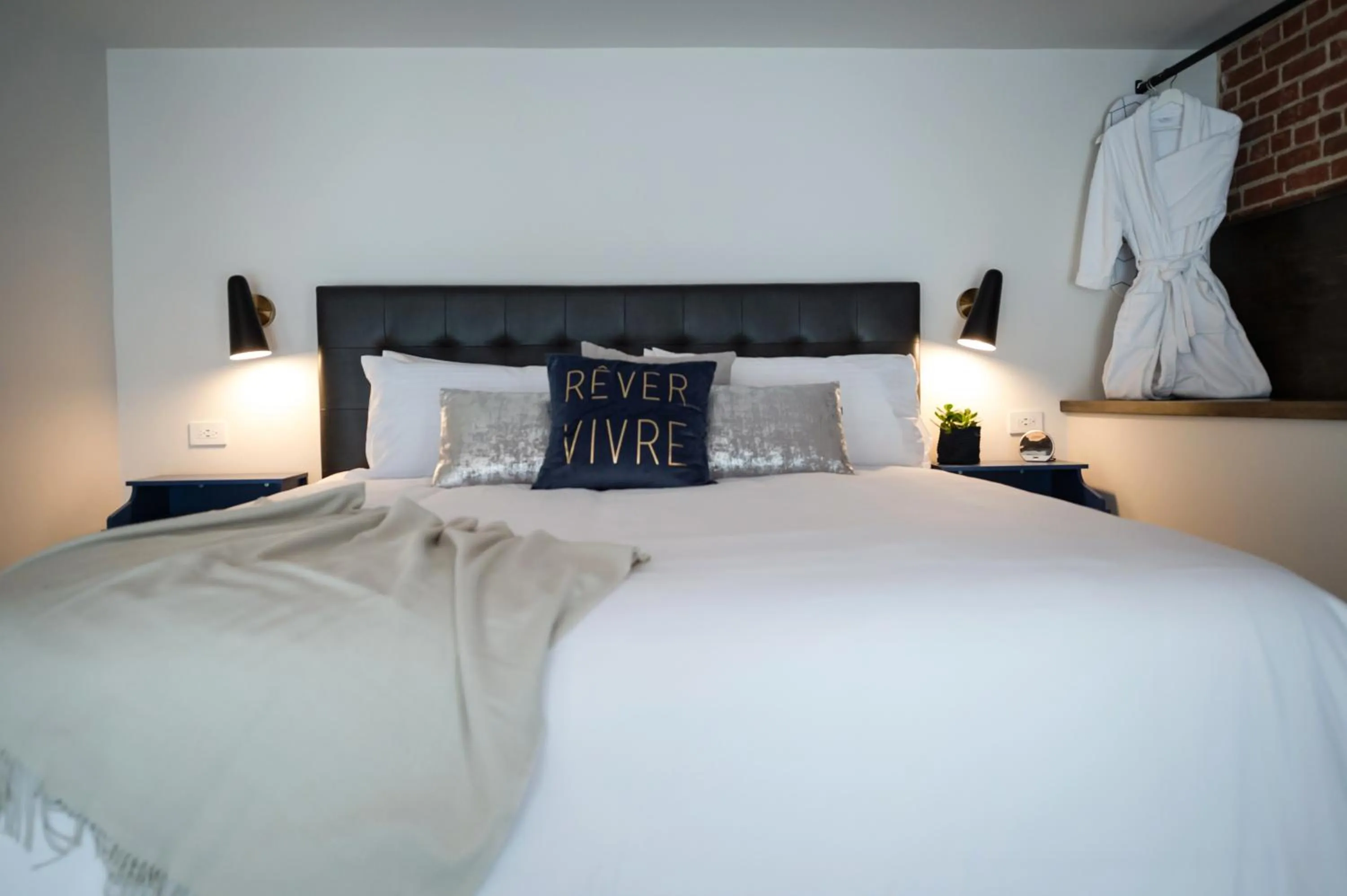 Bed in 48 King West Boutique Hotel