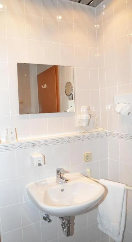 Toilet in Central Inn Hotel garni