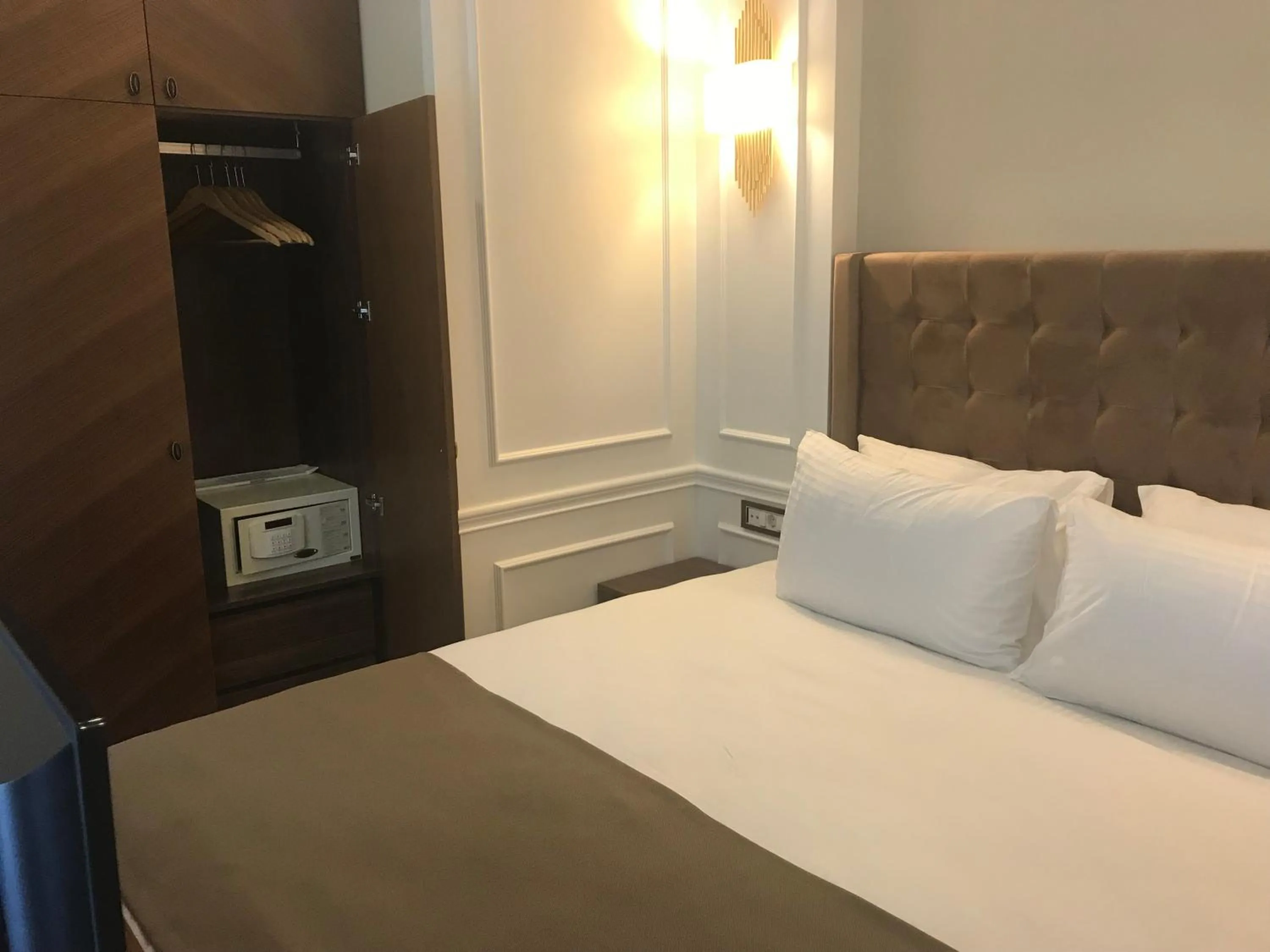 Bed in Old Port Hotel Suit