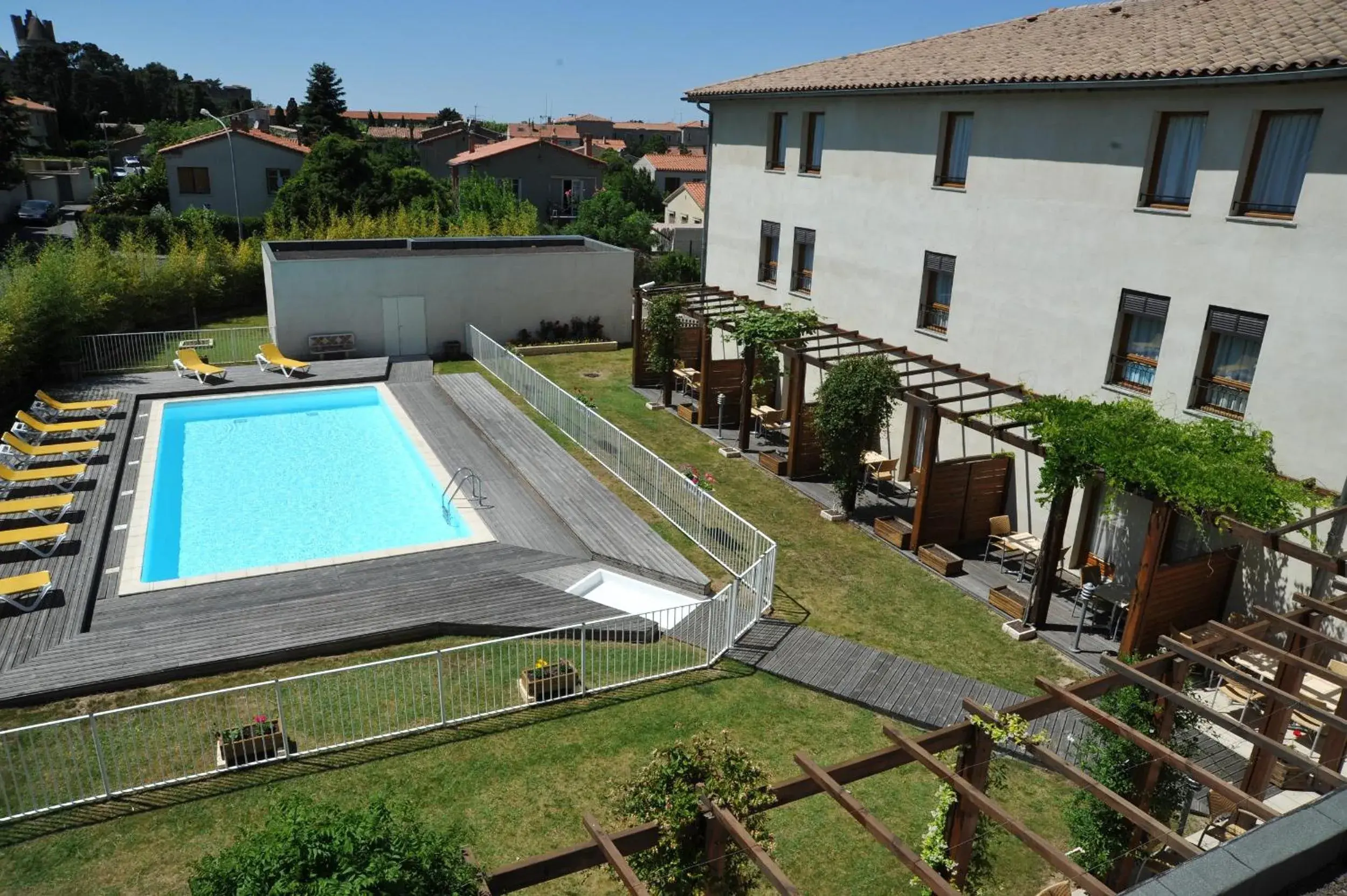 Pool view in ibis Styles Carcassonne La Cité Pool view in ibis Styles Carcassonne La Cité