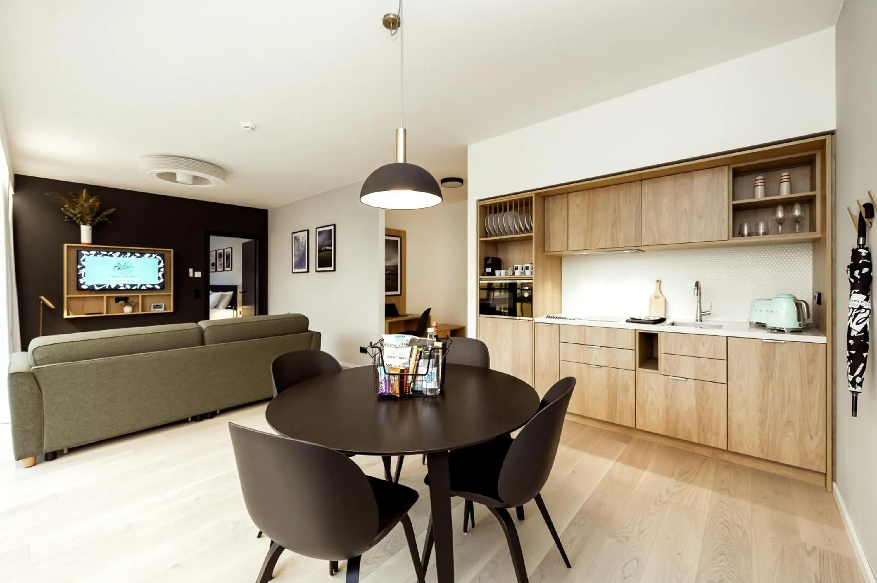 Living room in Wilde Aparthotels Berlin, Checkpoint Charlie Living room in Wilde Aparthotels Berlin, Checkpoint Charlie