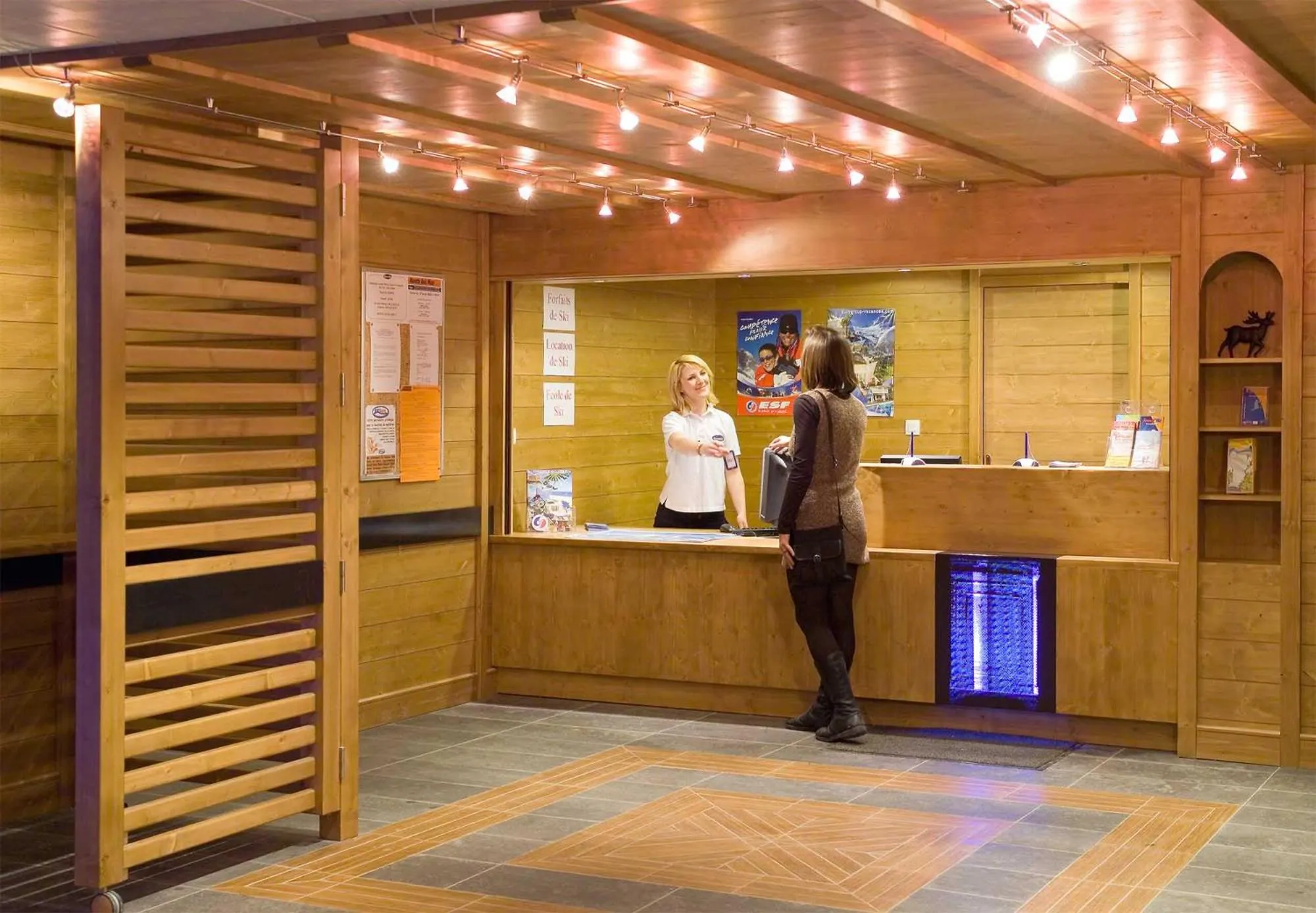 Lobby or reception in Madame Vacances Résidence Le Parc Des Airelles