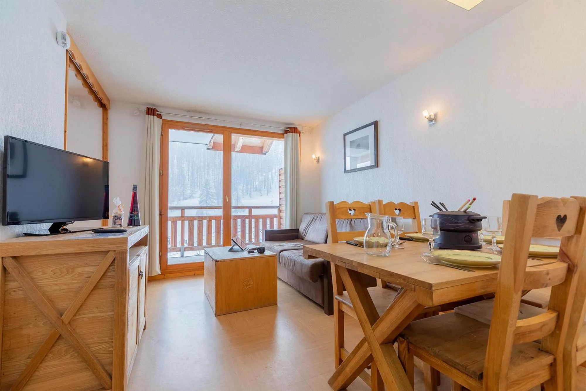 Living room in Madame Vacances Résidence Le Parc Des Airelles