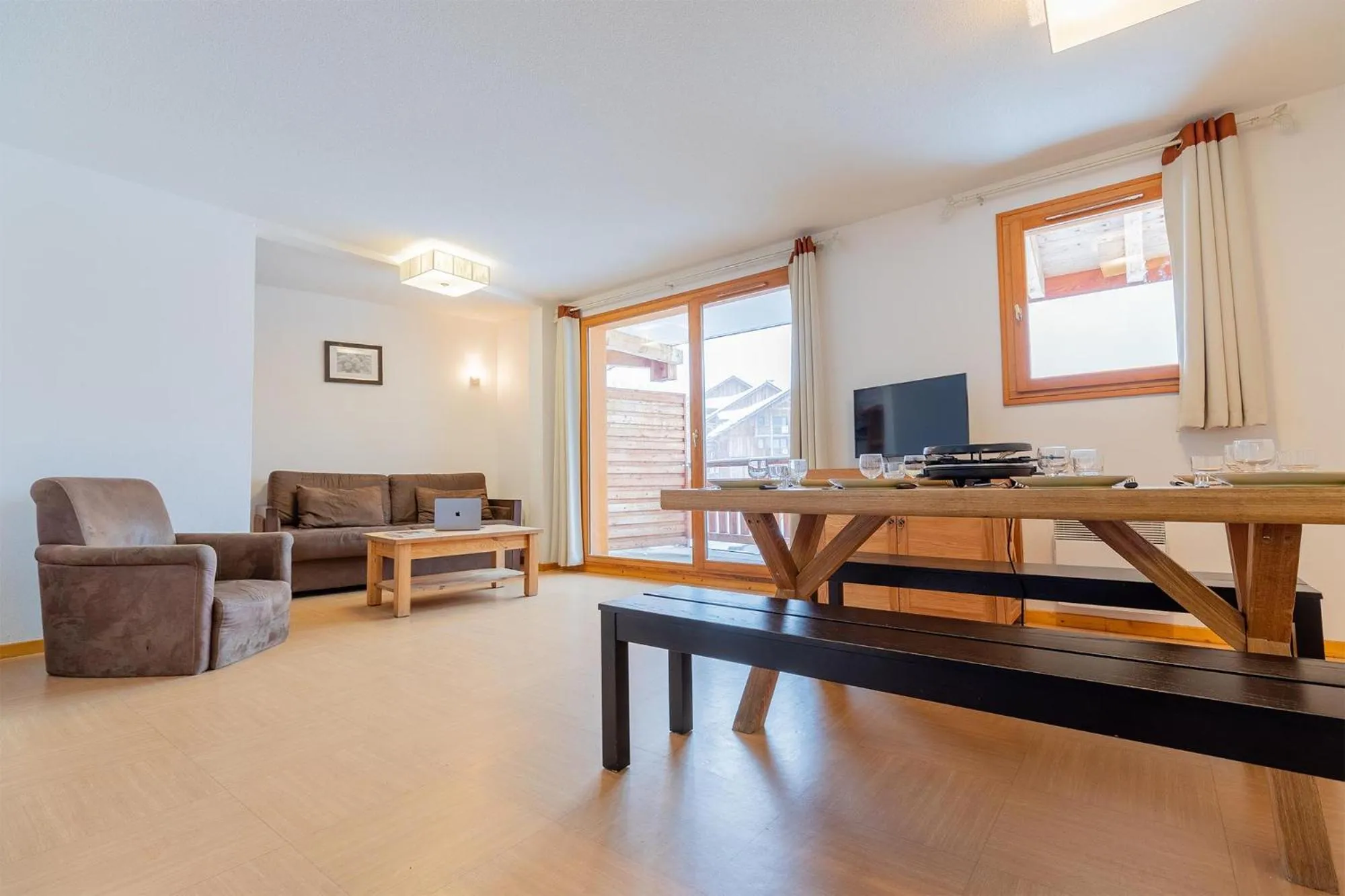 Living room in Madame Vacances Résidence Le Parc Des Airelles