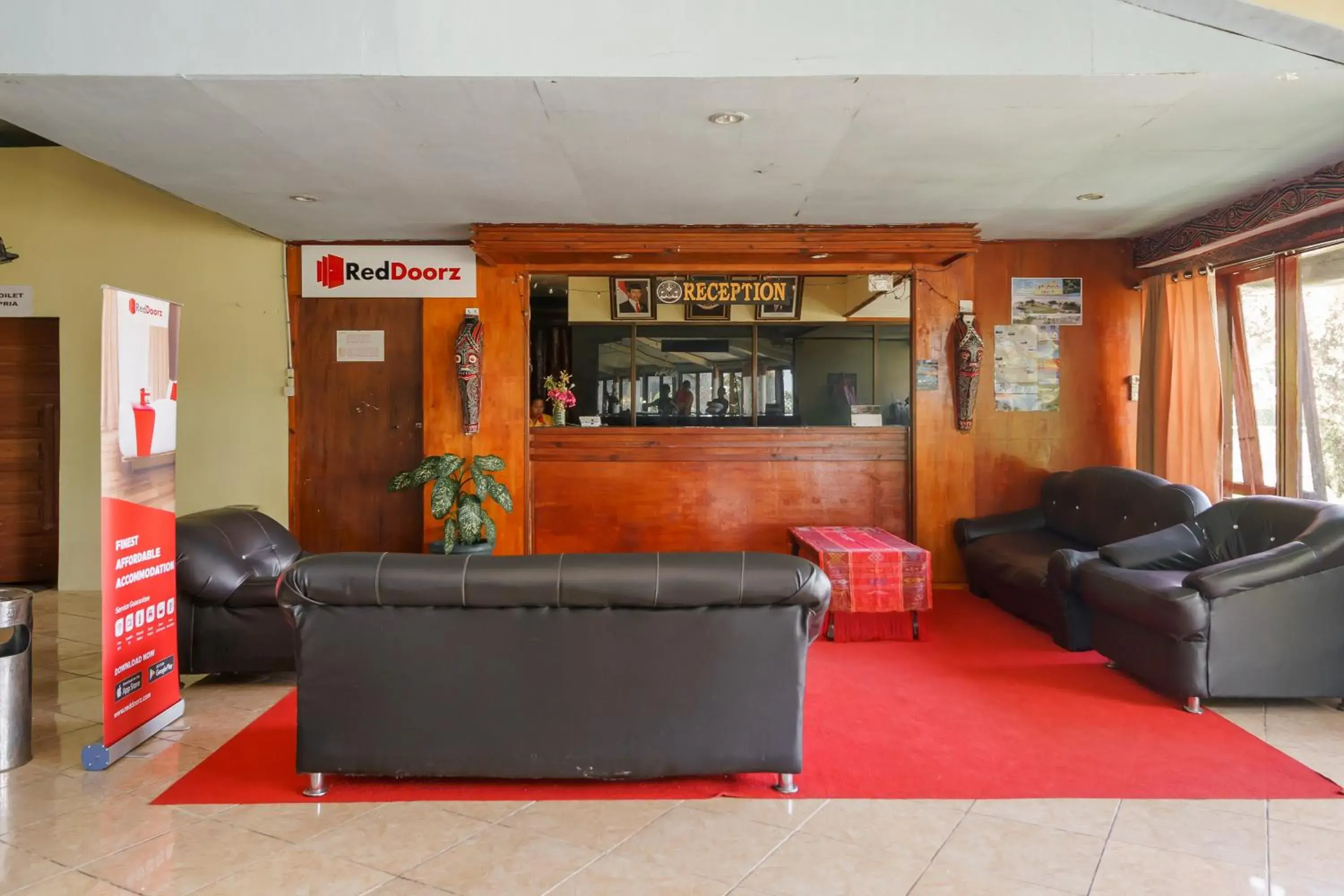 Living room in RedDoorz @ Tuktuk Danau Toba Living room in RedDoorz @ Tuktuk Danau Toba