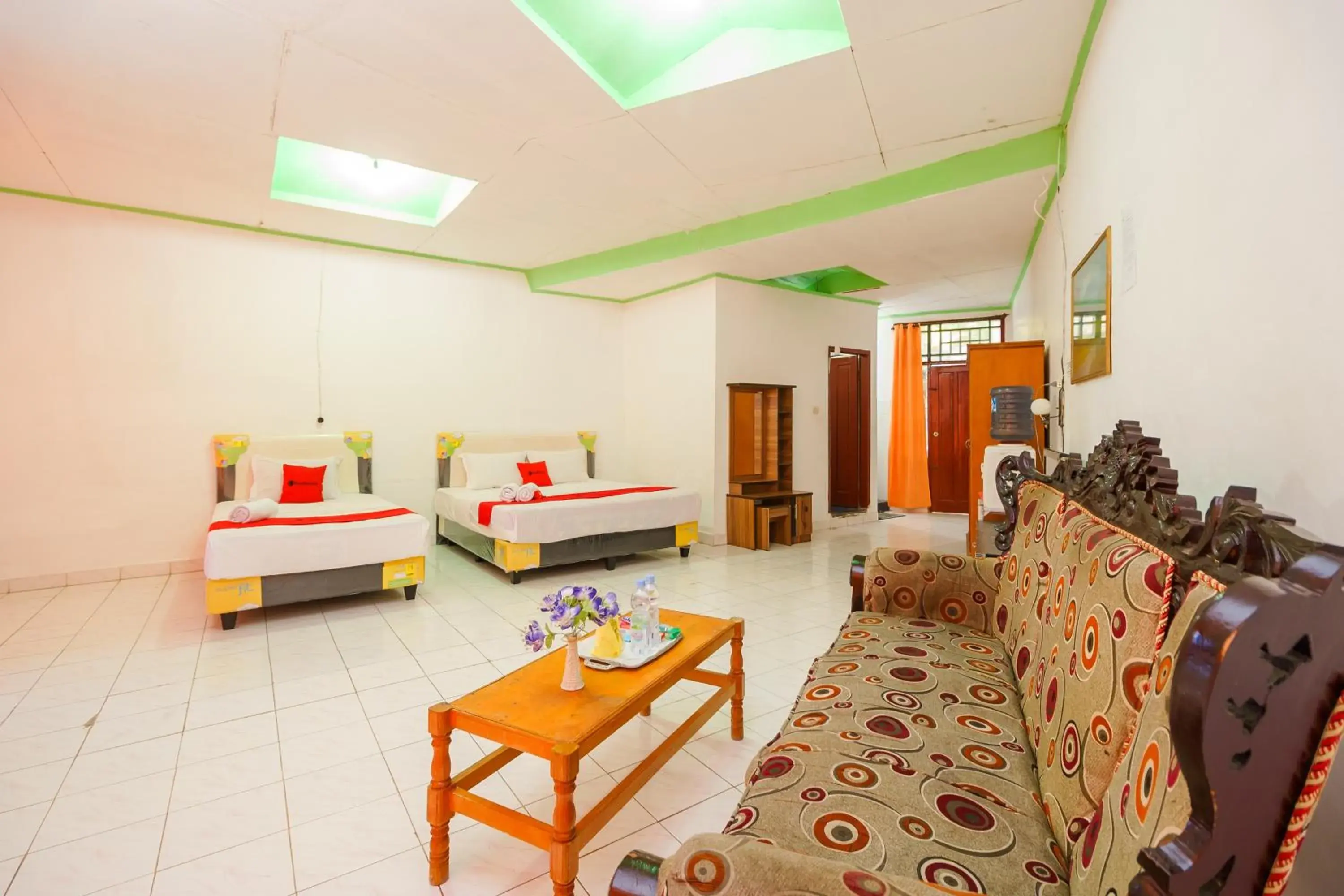 Bed in RedDoorz @ Tuktuk Danau Toba Bed in RedDoorz @ Tuktuk Danau Toba