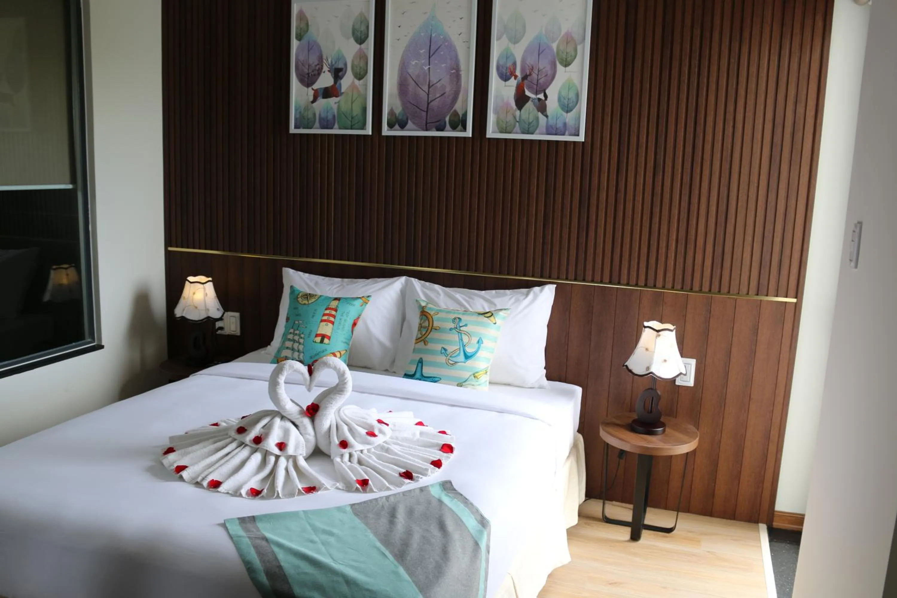 Bed in The Fish Village Villa